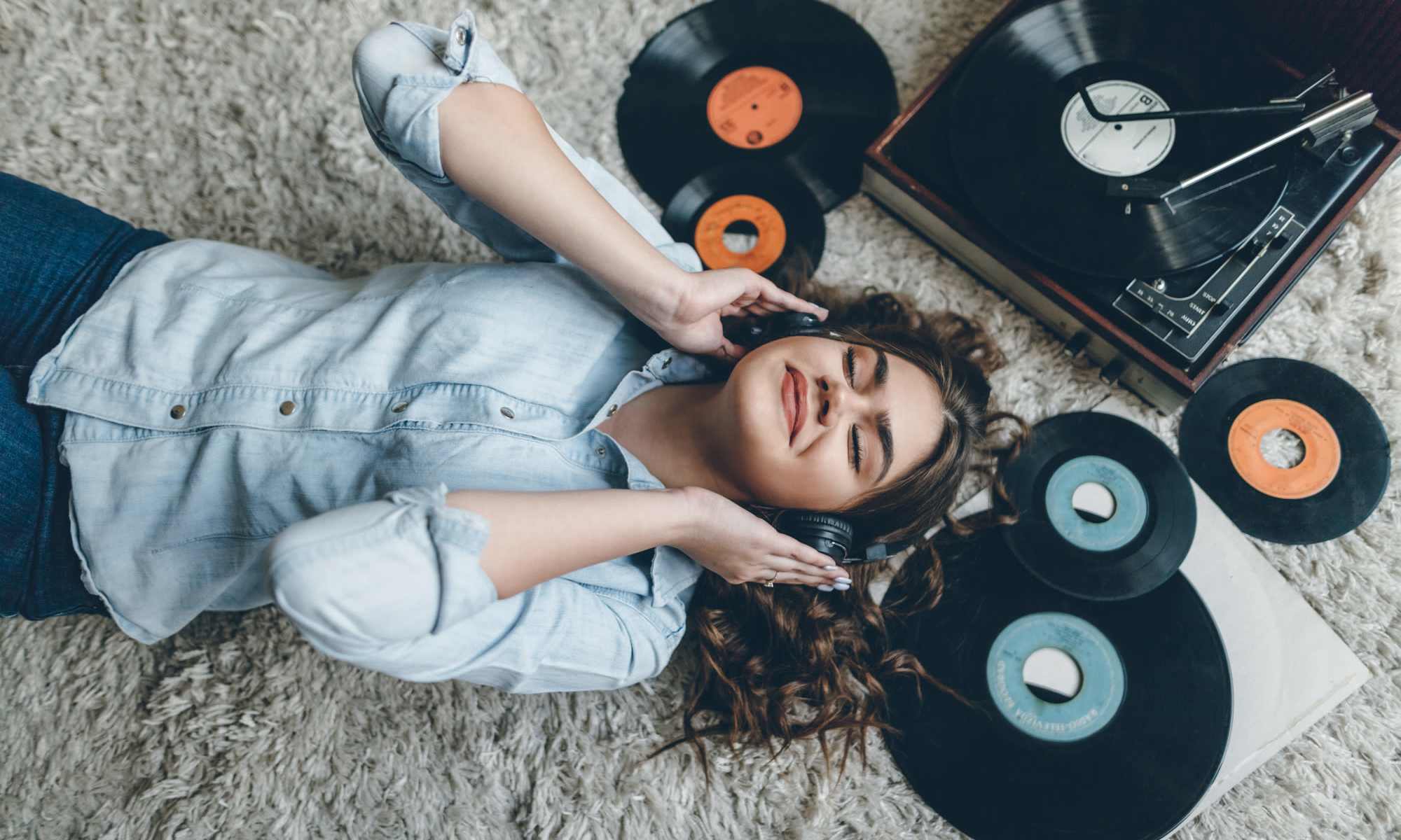 Happy woman listening to music at City View Apartments in Nashville, Tennessee