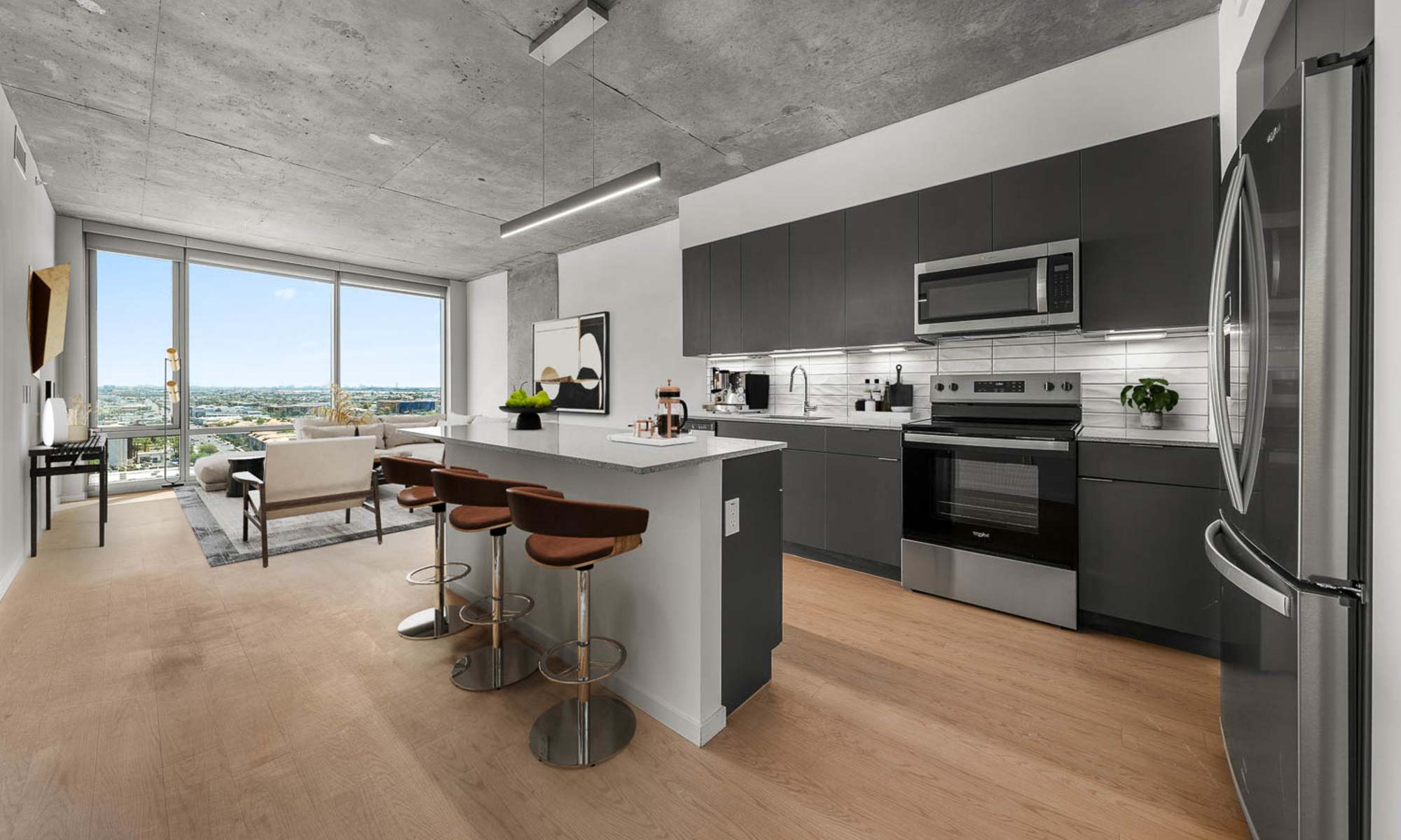 Open concept floor plan kitchen with stainless steel appliances PALMtower in Phoenix, Arizona