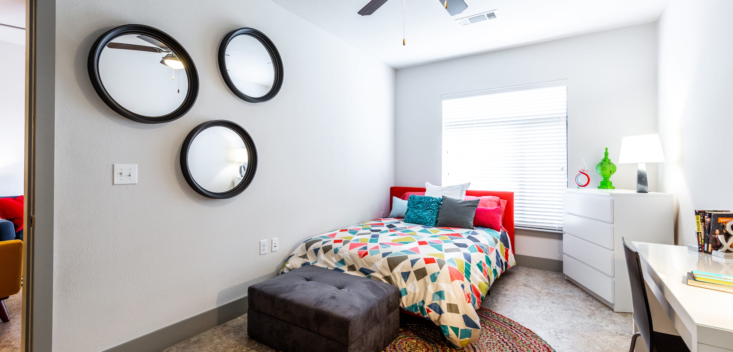 Bedroom with large window at Regents West at 24th in Austin, Texas