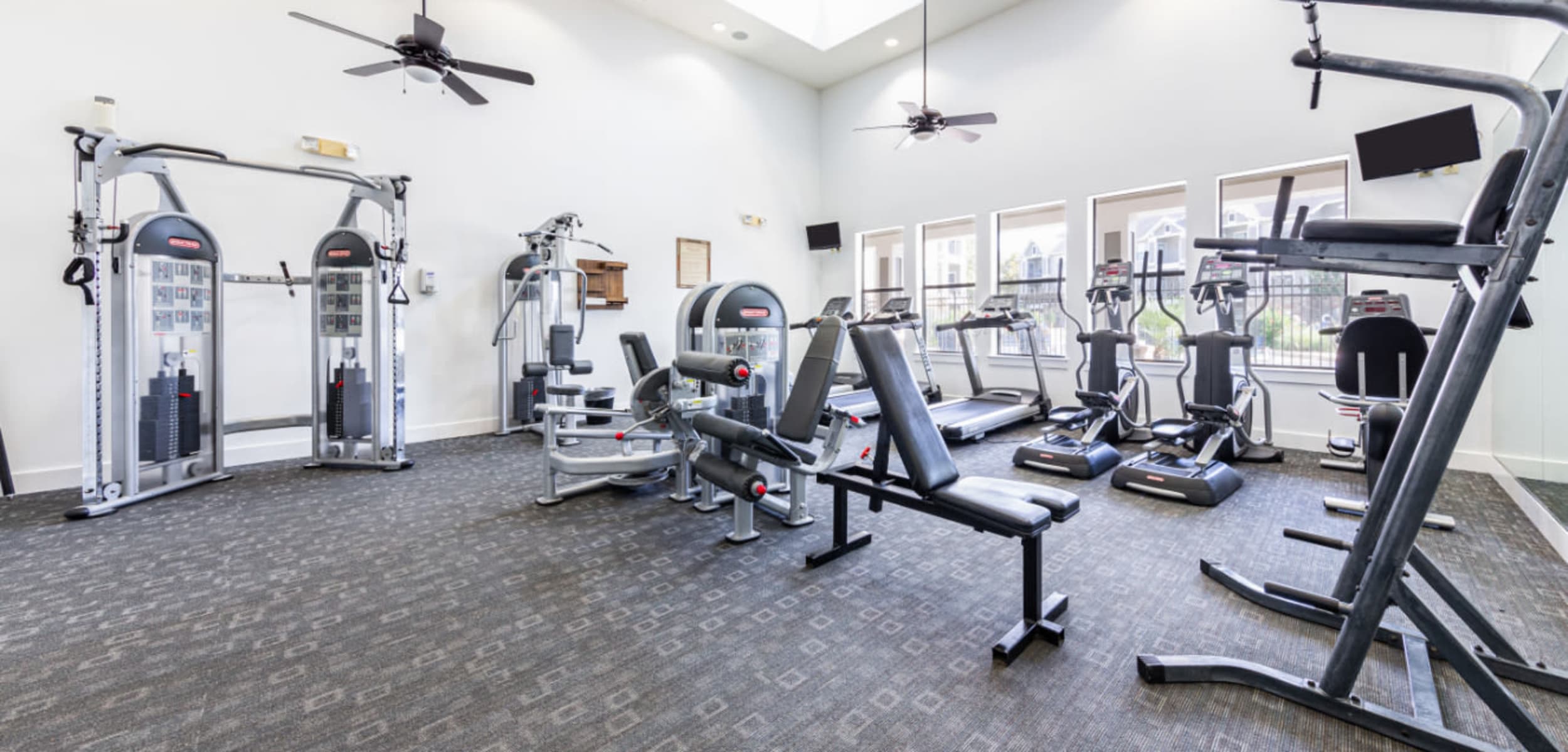 Well-equipped gym at Marquis at Katy in Katy, Texas