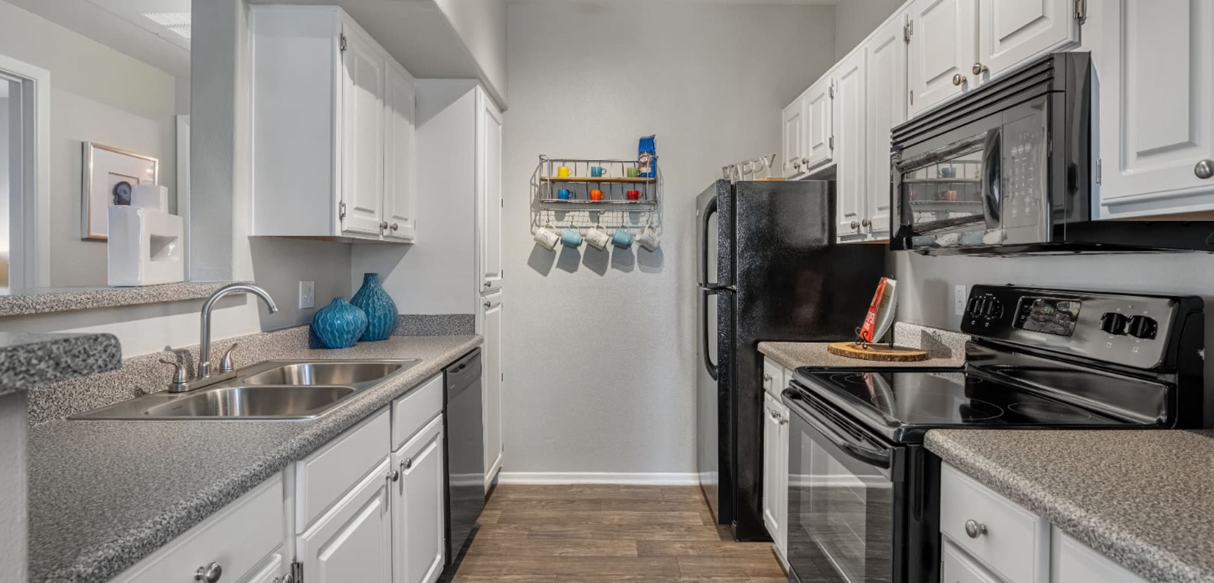Modern, sleek kitchen with modern appliances at Alante at the Islands in Chandler, Arizona