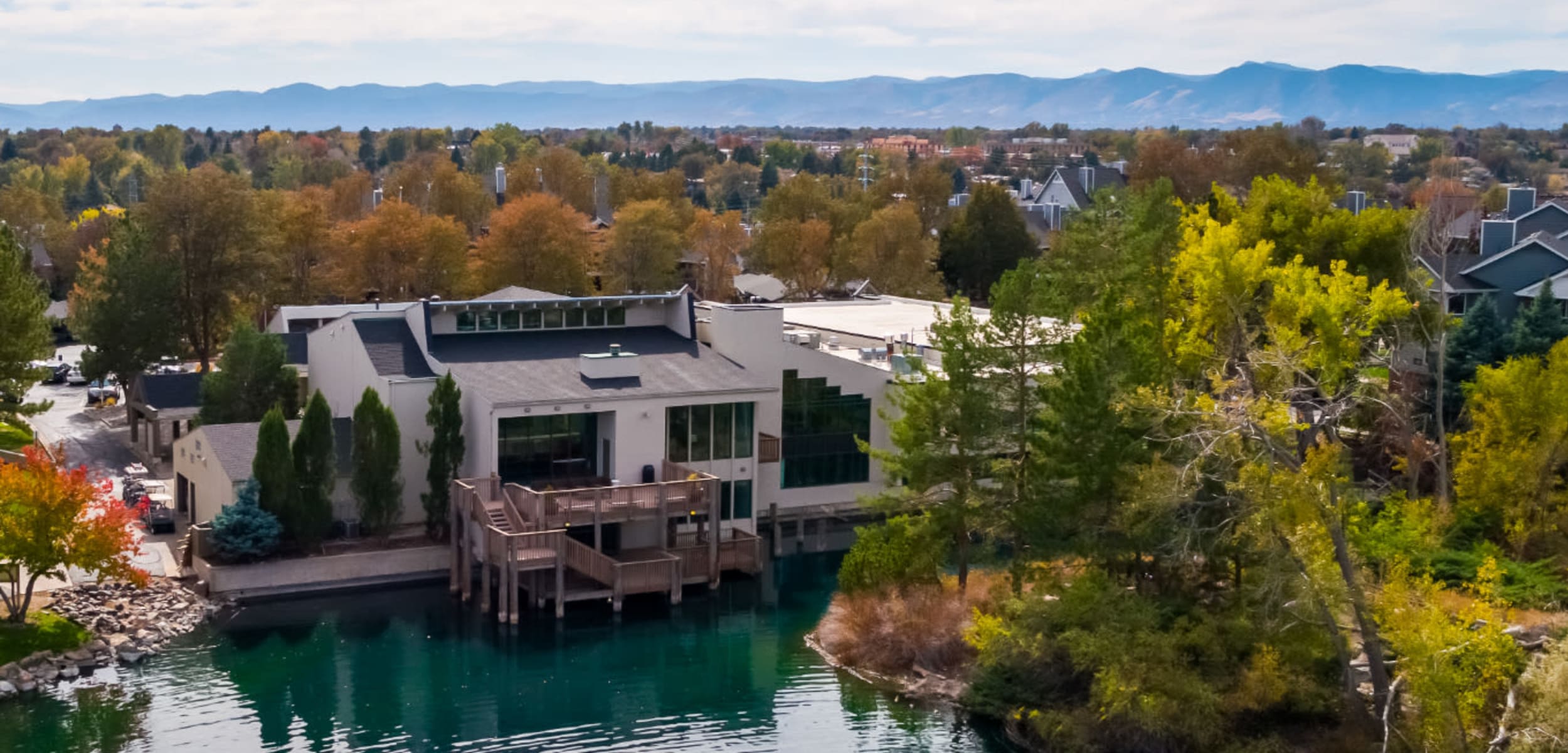 Aerial view of property next to lake at Ashford Belmar in Lakewood Colorado,