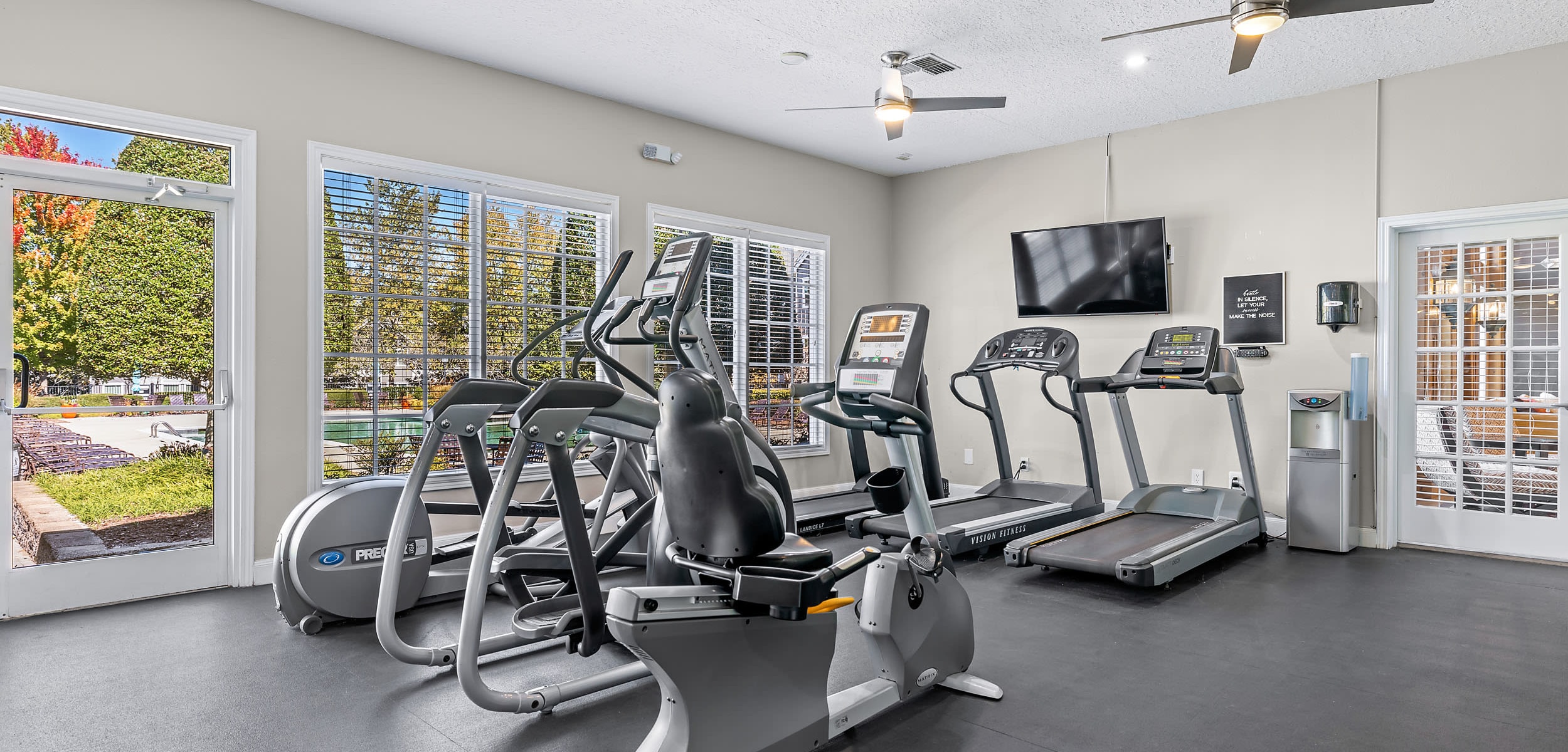 Gym with exercise machines at Marquis at Silverton in Cary, North Carolina