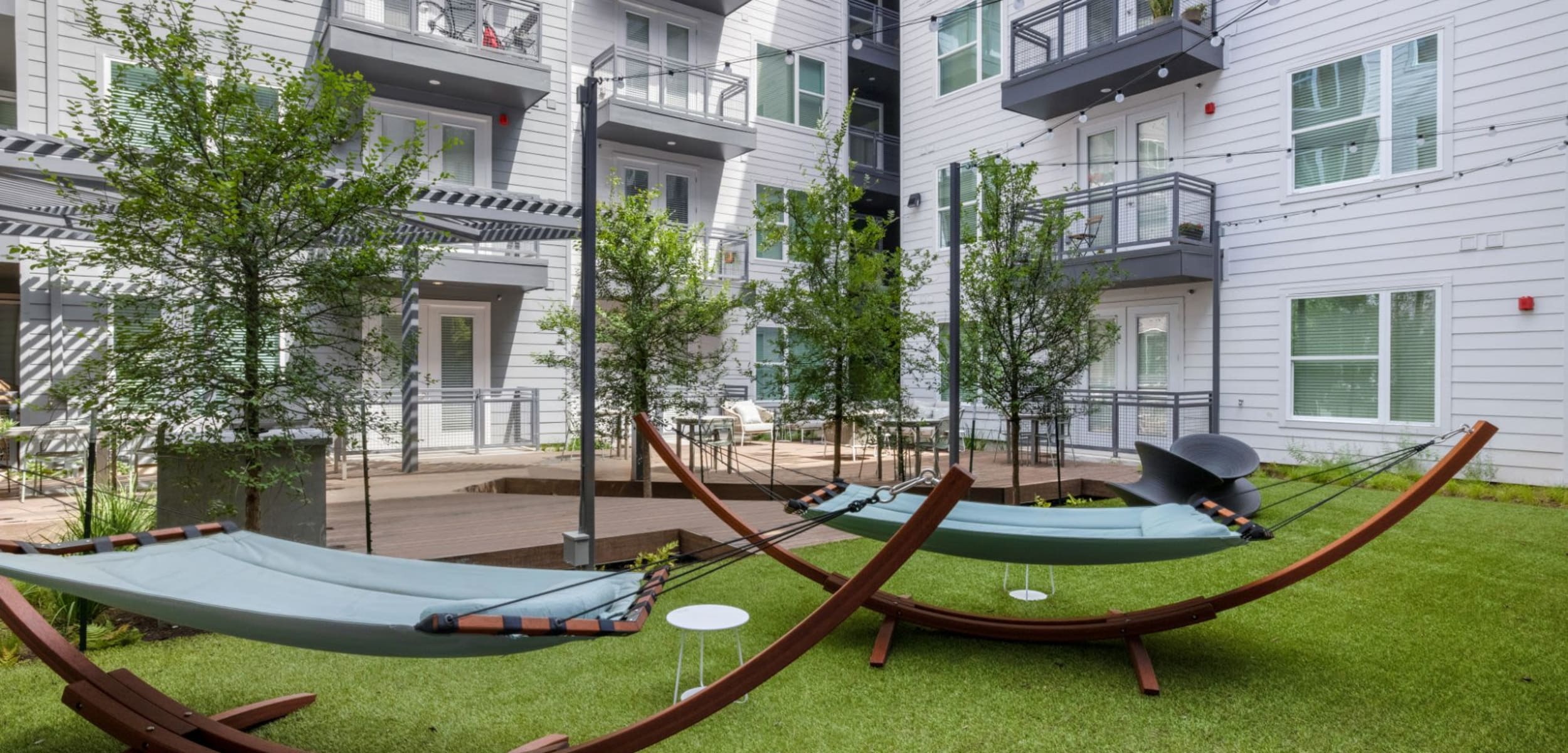 Courtyard area with hammocks at 44 South in Austin, Texas