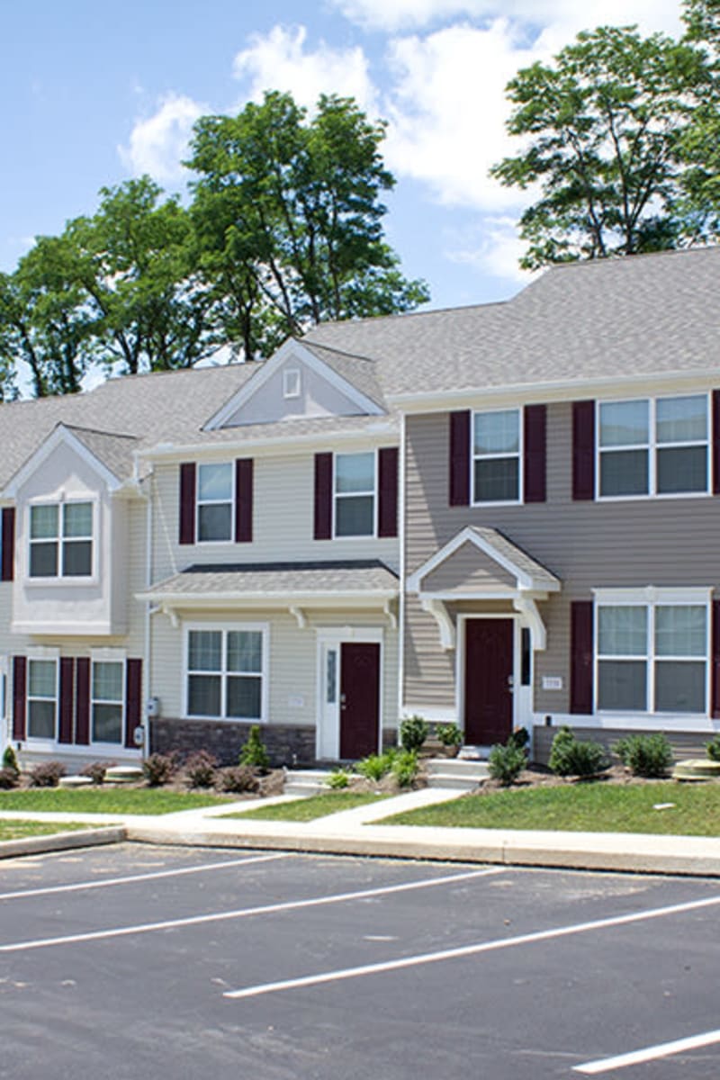 Exterior of Emerald Pointe Townhomes on a sunny spring day in Harrisburg, Pennsylvania