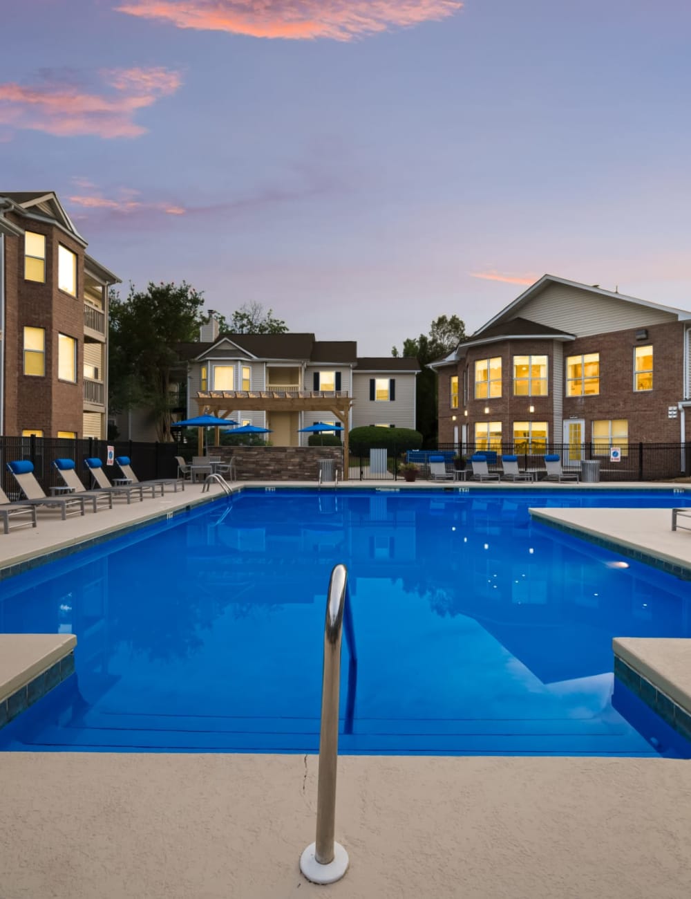 The blue community swimming pool at Chace Lake Villas in Birmingham, Alabama