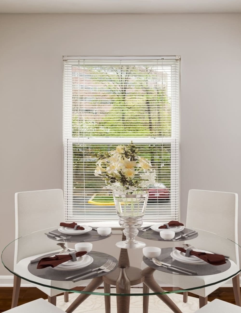 A well set dining room table in a model apartment at Hunt Club in Gaithersburg, Maryland