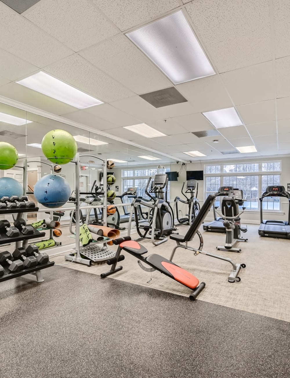 Exercise equipment in the fitness center at Park at Kingsview Village in Germantown, Maryland