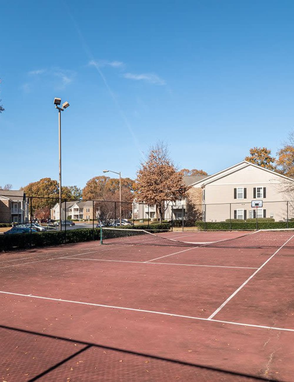 An outdoor tennis court for residents at Brighton Park in Byron, Georgia