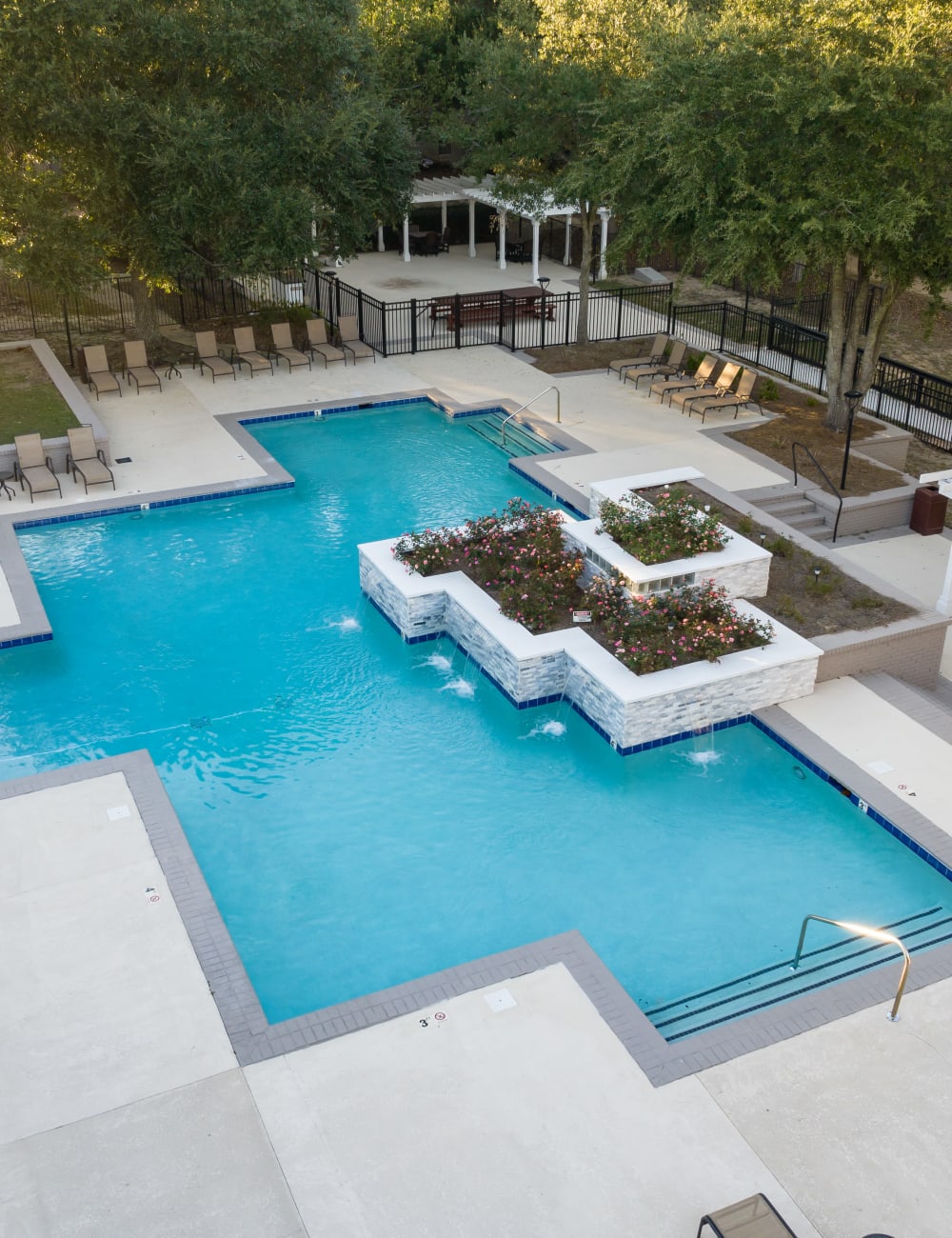 The sparkling community swimming pool at Lenox Gates in Mobile, Alabama