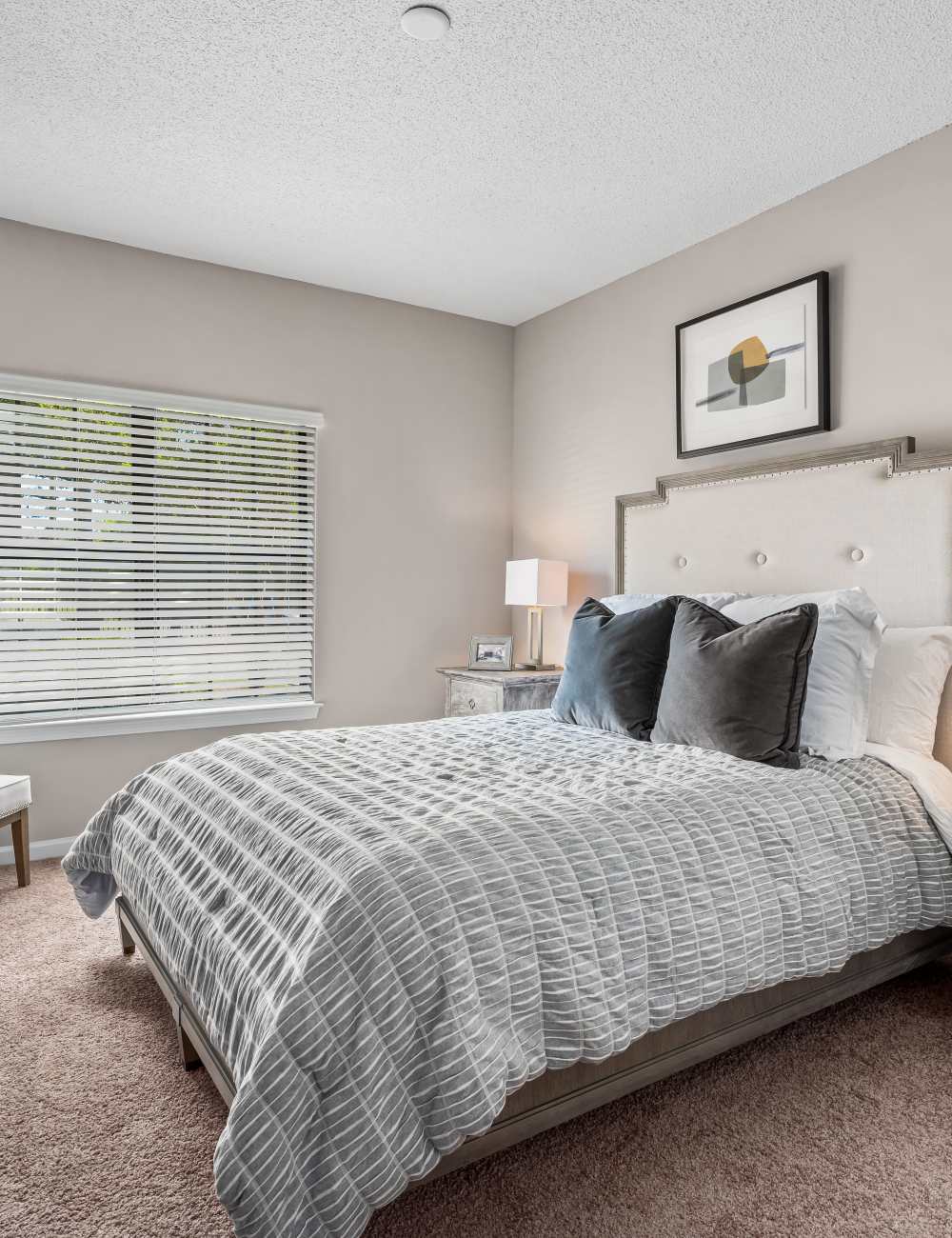 A furnished apartment bedroom at The Oaks of St. Clair in Moody, Alabama