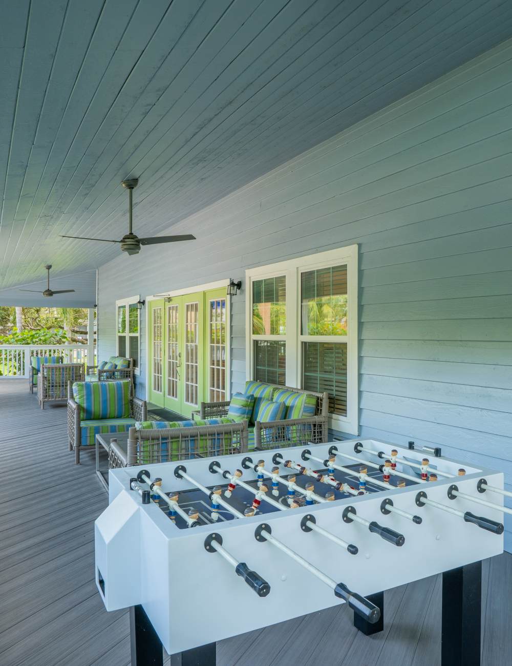 Covered outdoor seating on the patio at Mode at Ballast Point in Tampa, Florida