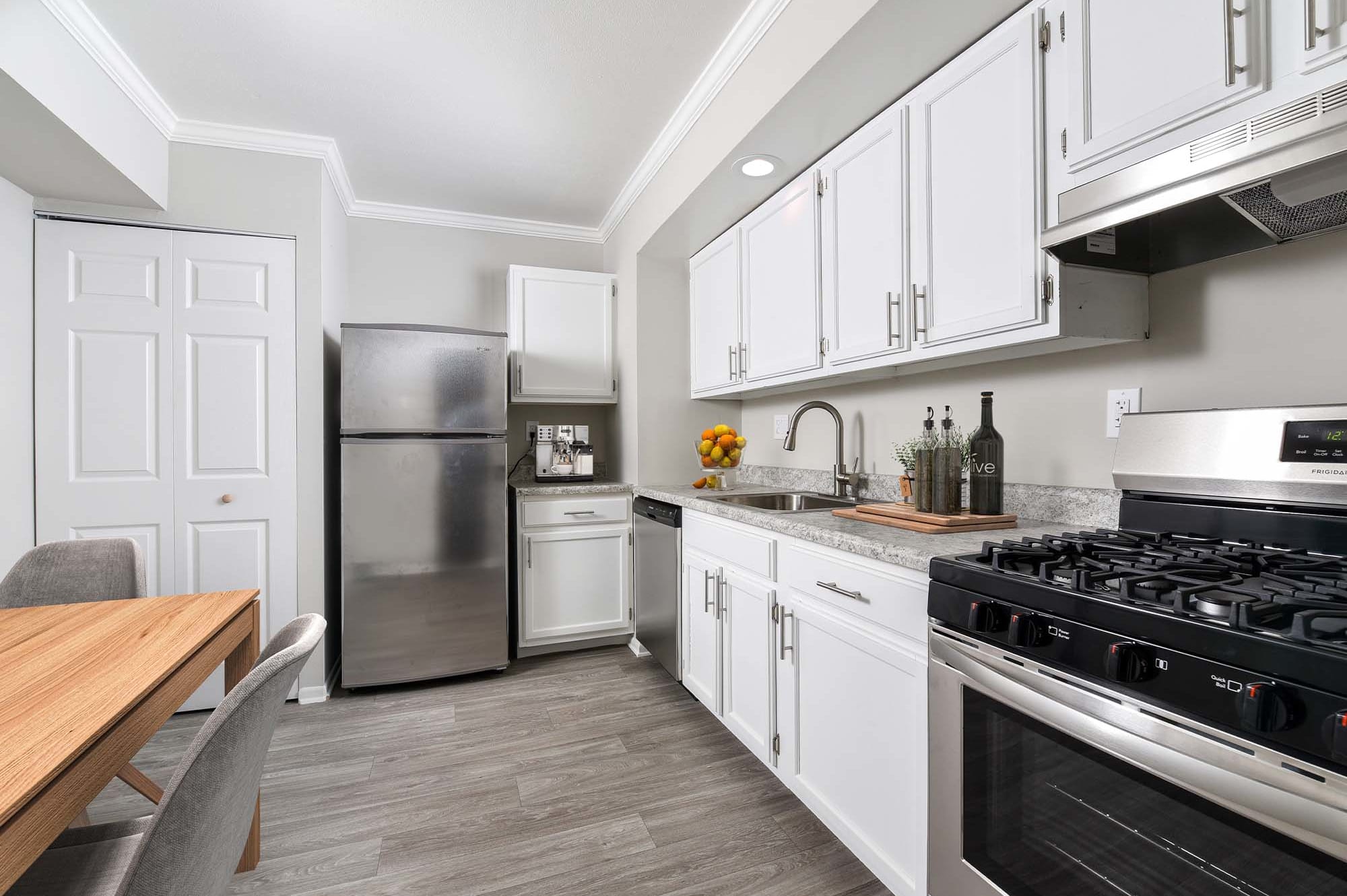 Model kitchen with white cabinets at The Nolan, Morrisville, Pennsylvania