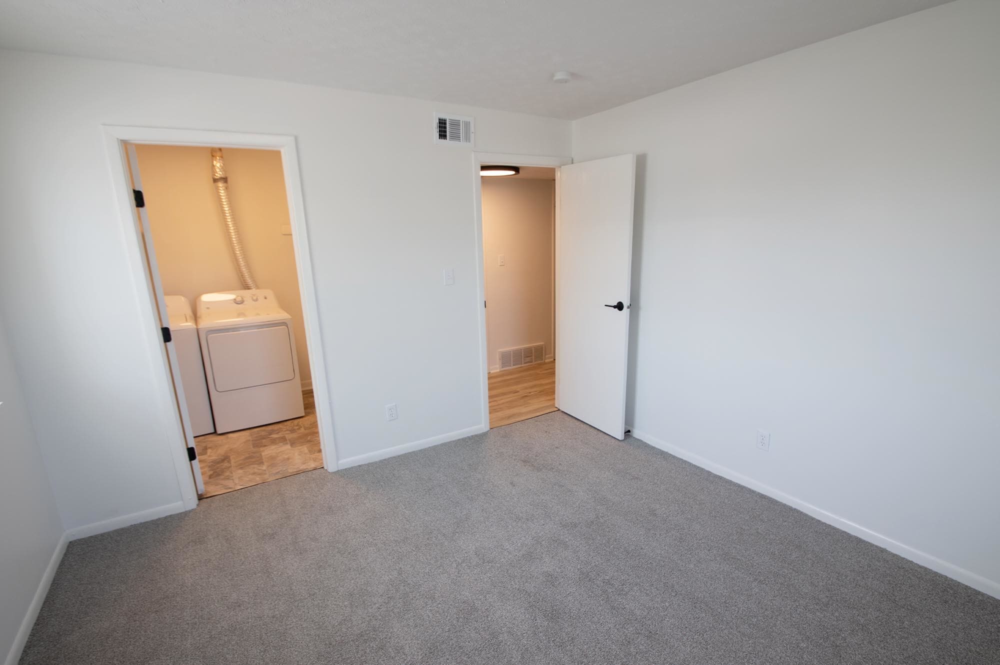 Spacious closet with washer and dryer hookups at Pointe at Northern Woods in Columbus, Ohio