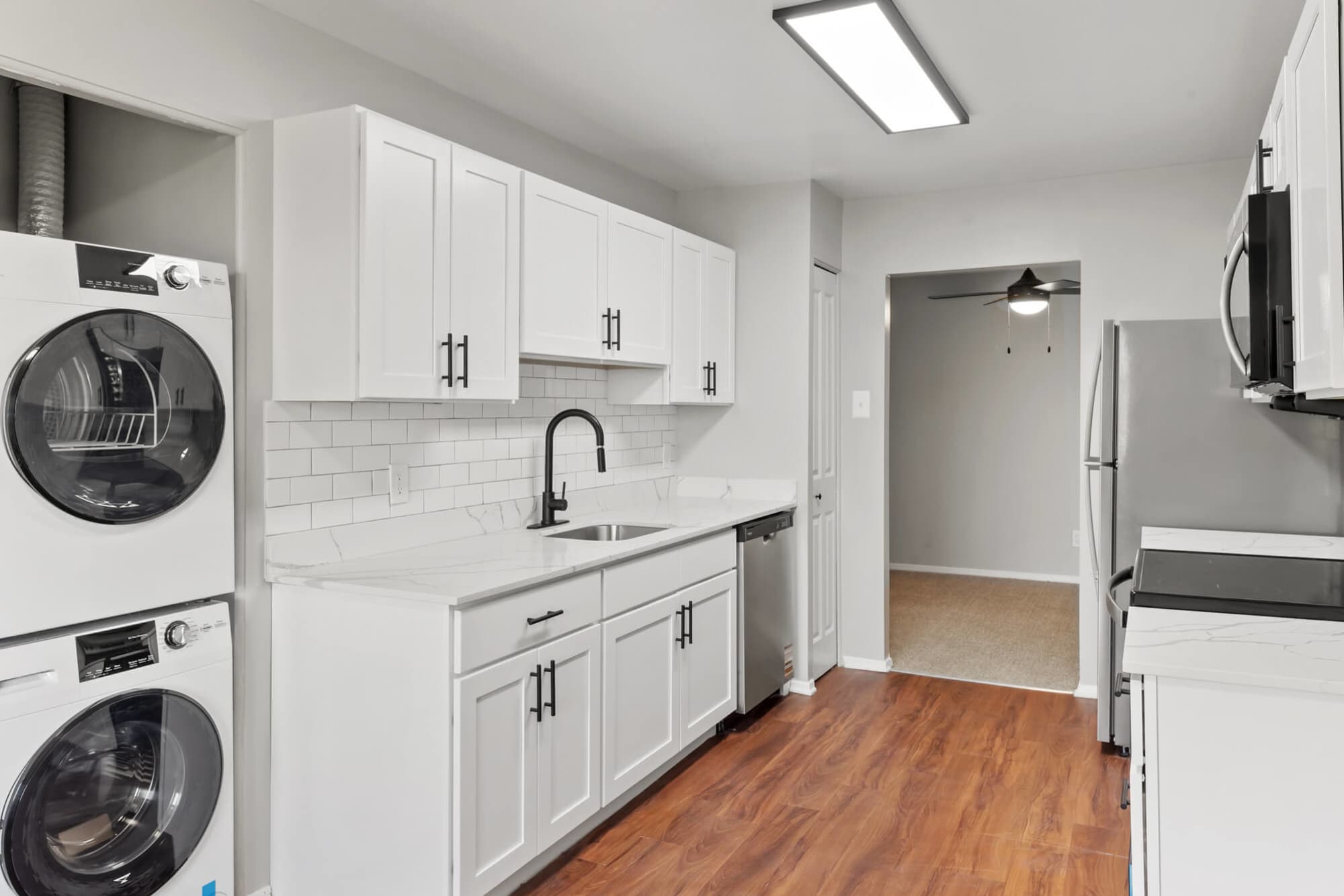 Renovated kitchen with in unit washer & dryer at Greenspring in York, Pennsylvania