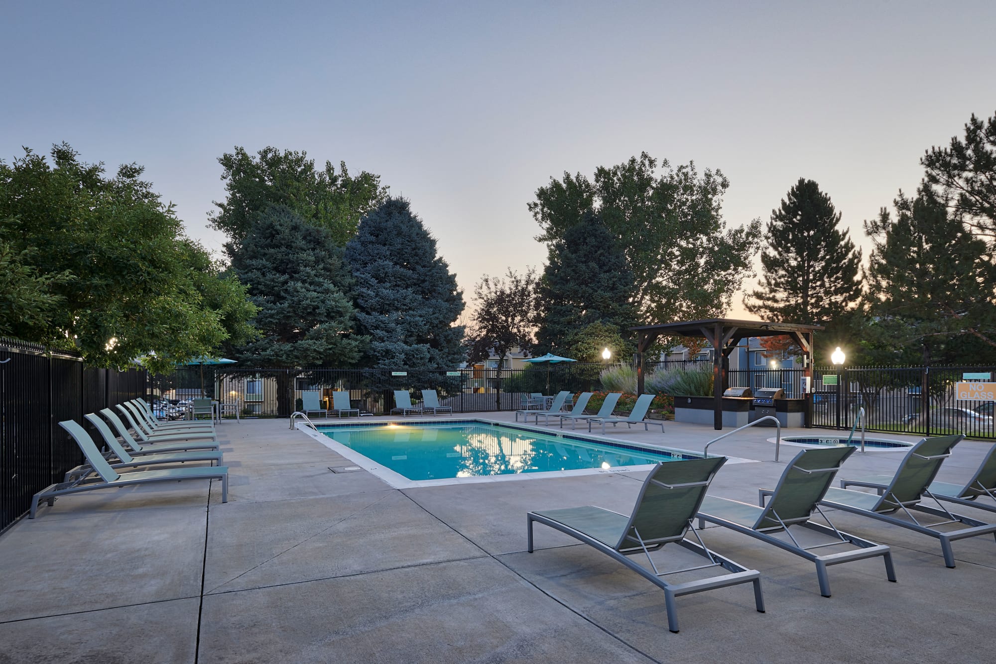 A swimming pool that is great for entertaining at Alton Green Apartments in Denver, Colorado