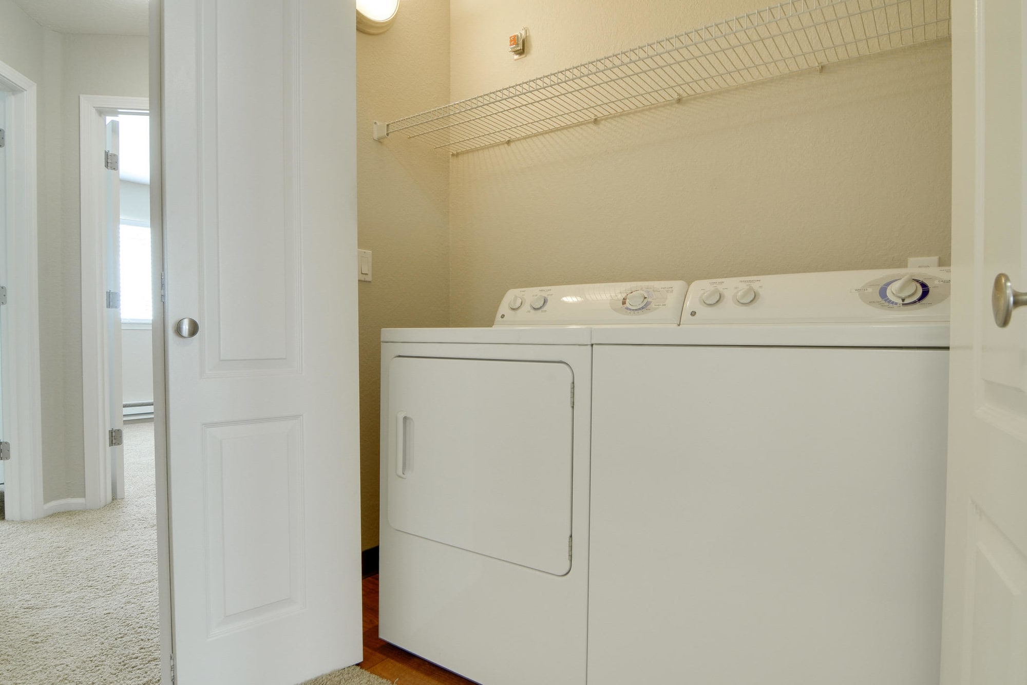 Full sized washer and dryer in apartments at Carriage House Apartments in Vancouver, Washington