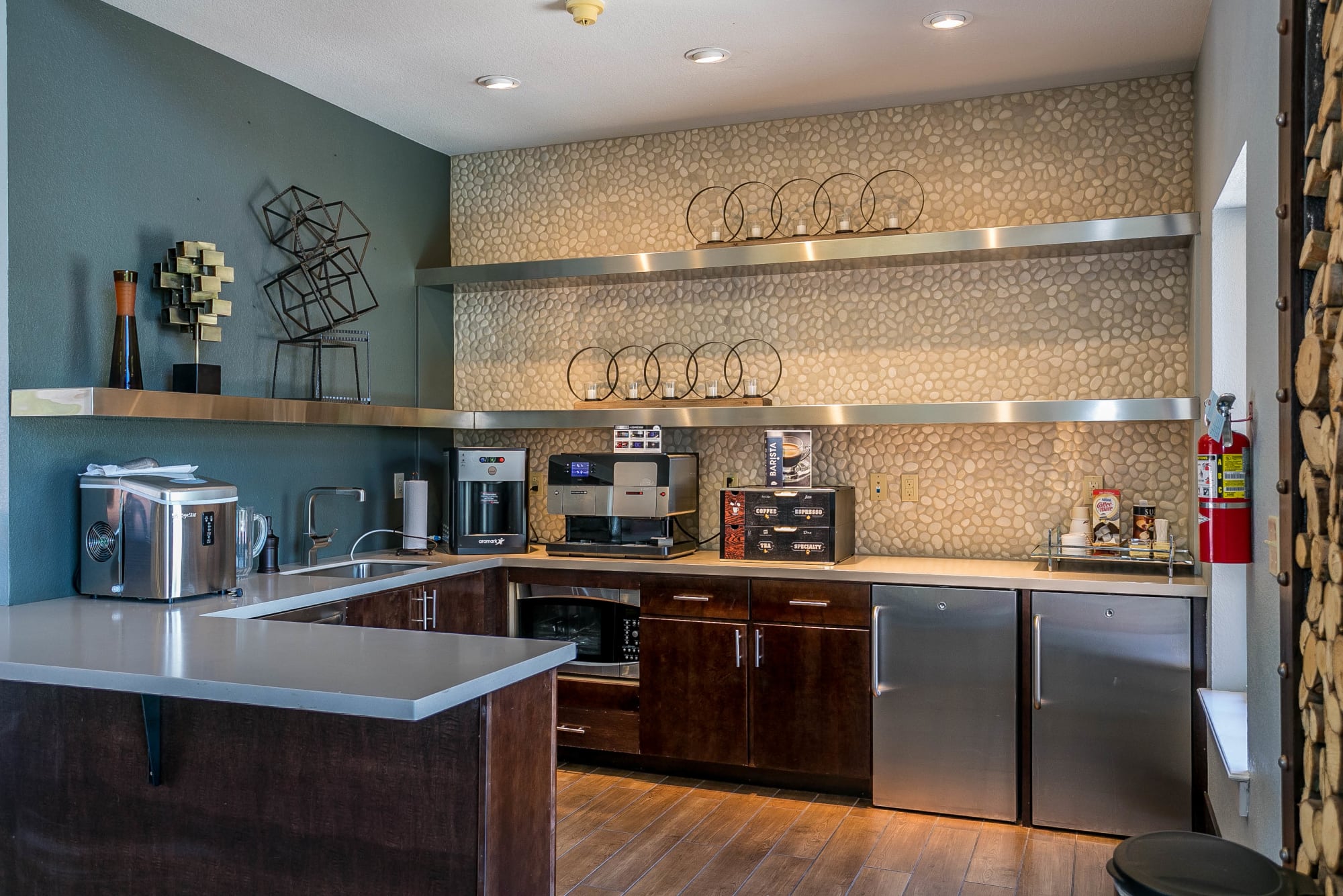 The clubhouse kitchen at The Crossings at Bear Creek Apartments in Lakewood, Colorado