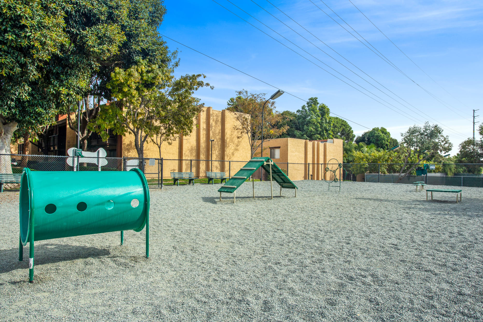 Off-leash dog park with toys at Shadow Ridge Apartments in Oceanside, California