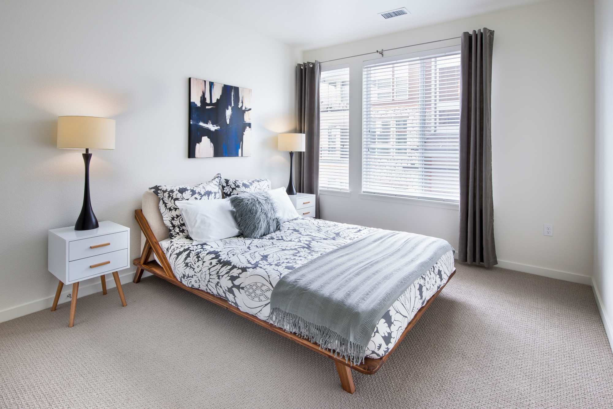 Bedroom with large windows at Elevate in Englewood, Colorado