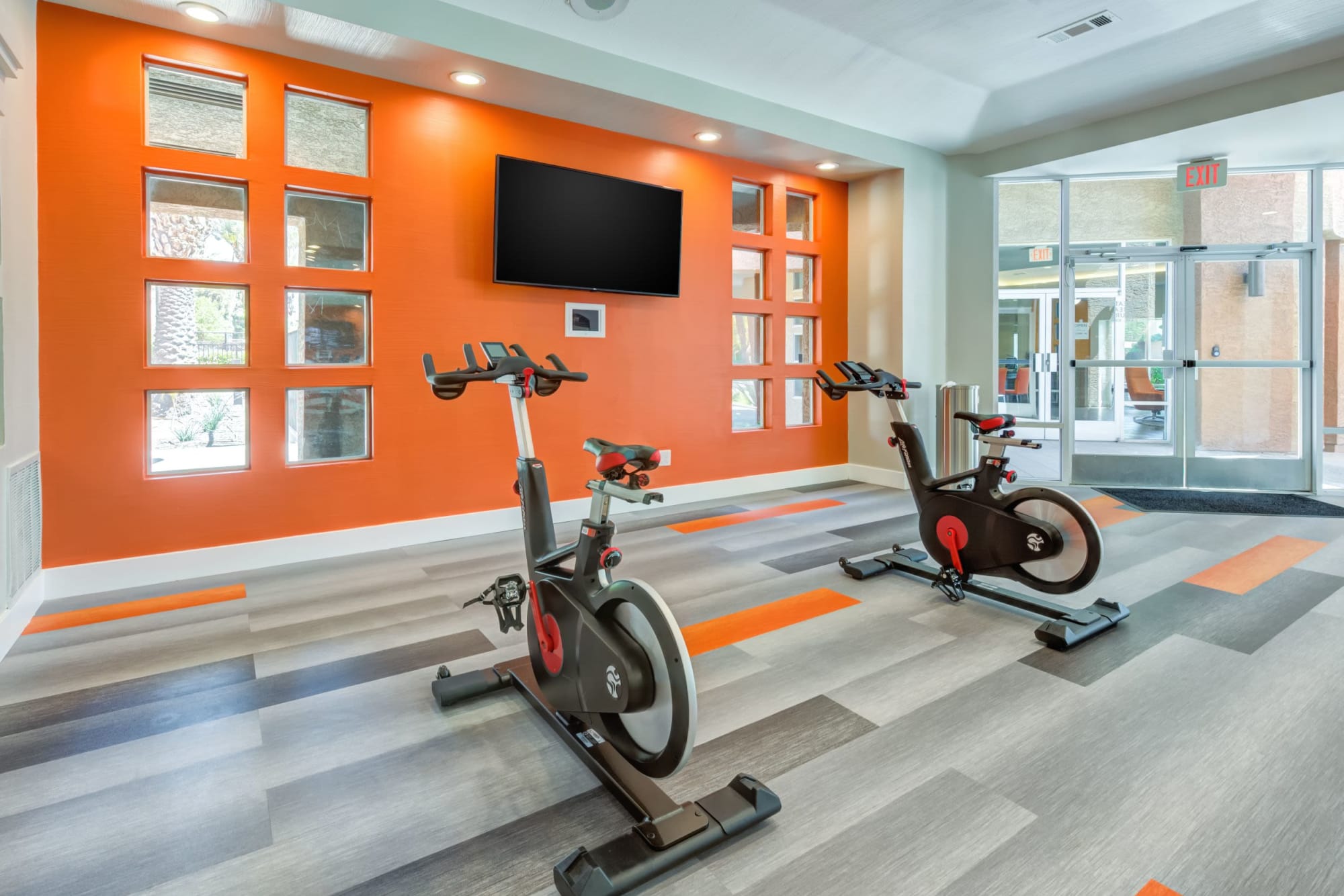 Fitness on demand room at Tuscany Village Apartments in Ontario, California
