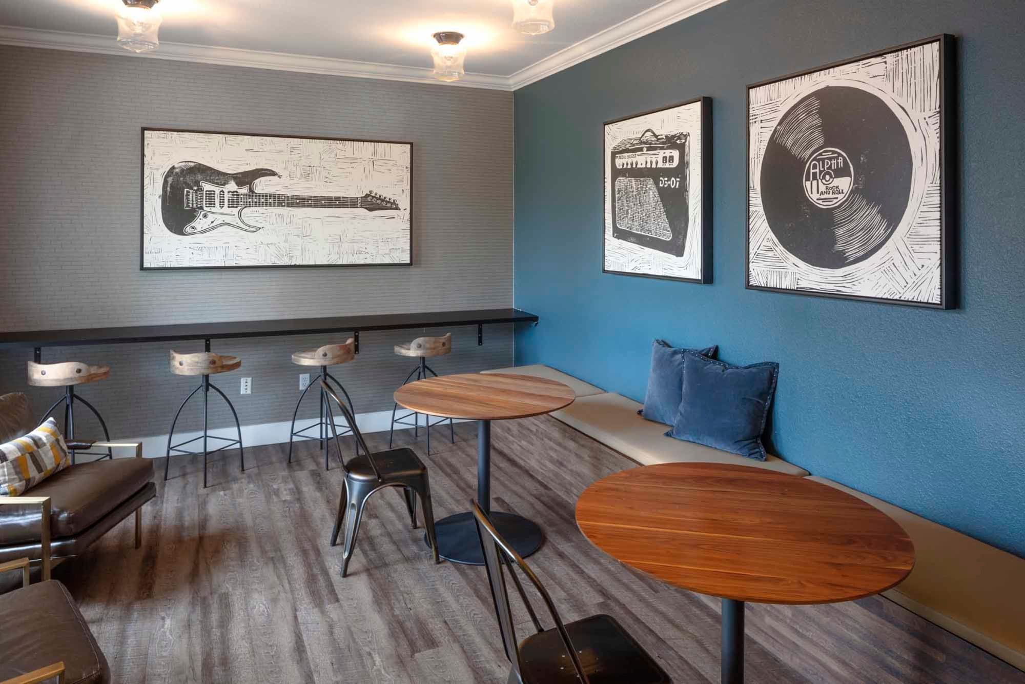 A common area with guitar on the wall at The Grove at Orenco Station in Hillsboro, Oregon