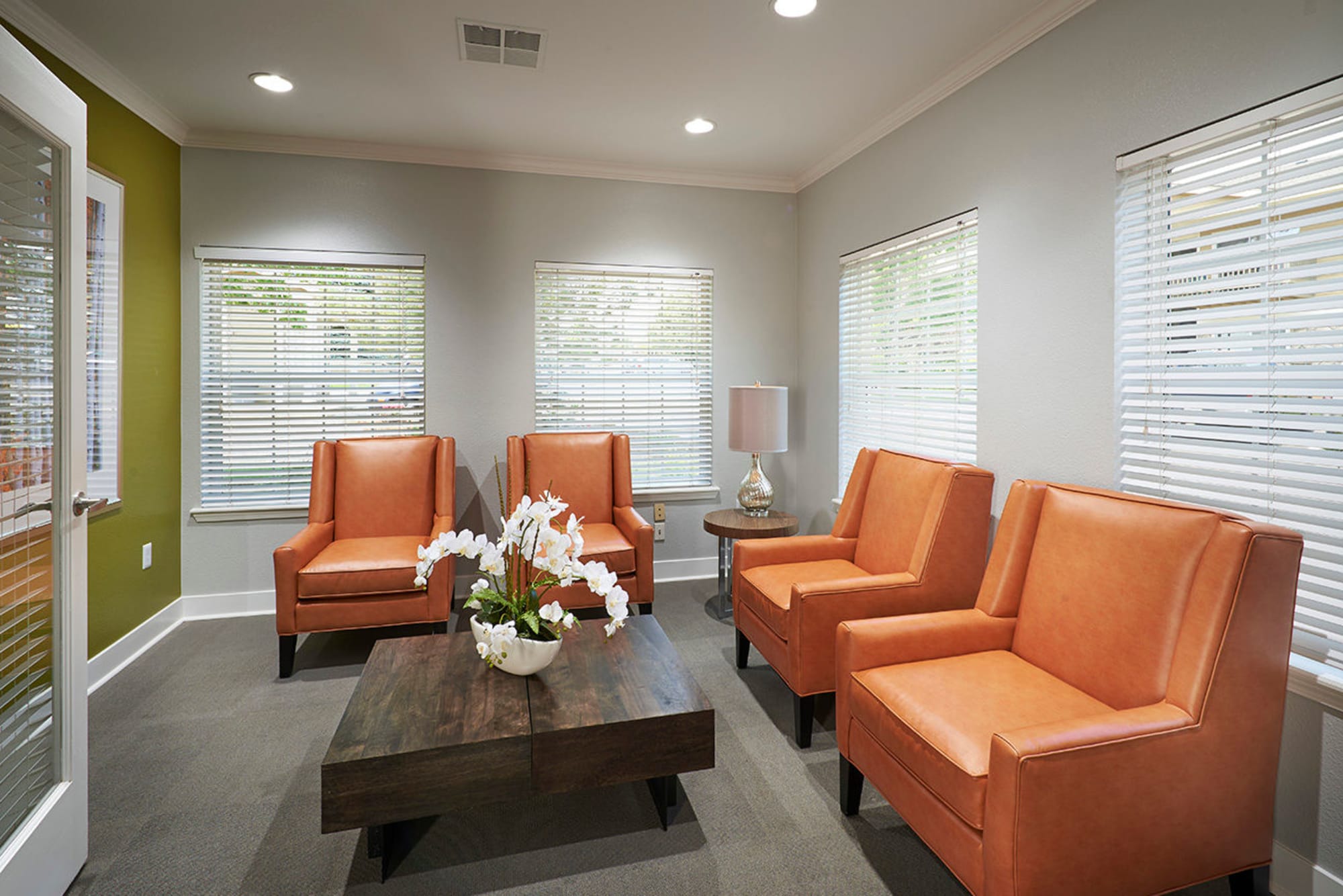 Clubhouse seating area at Crossroads at City Center Apartments in Aurora, Colorado