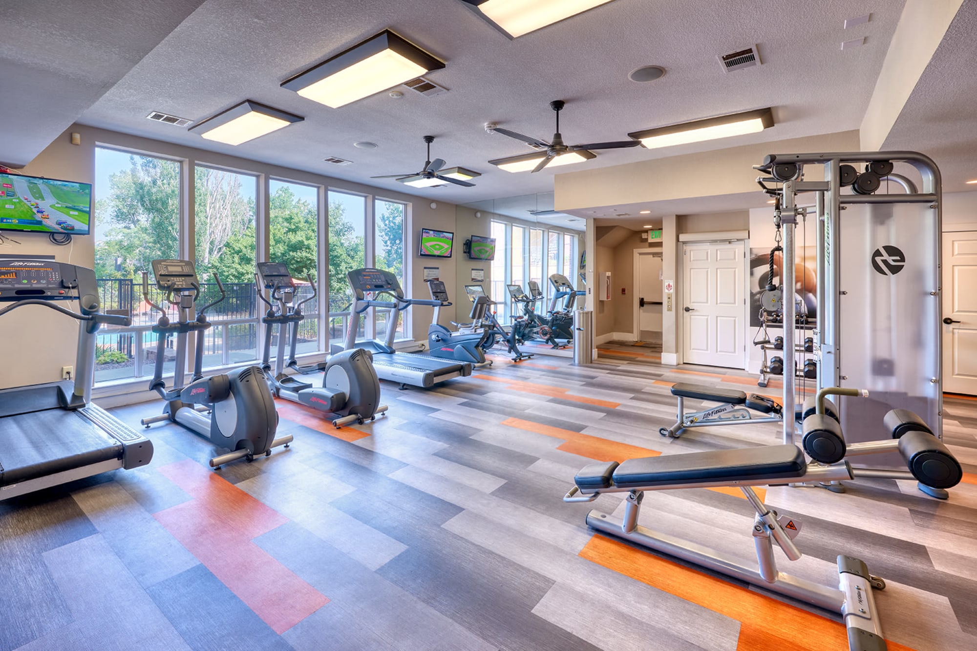 The newly renovated fitness center at The Crossings at Bear Creek Apartments in Lakewood, Colorado
