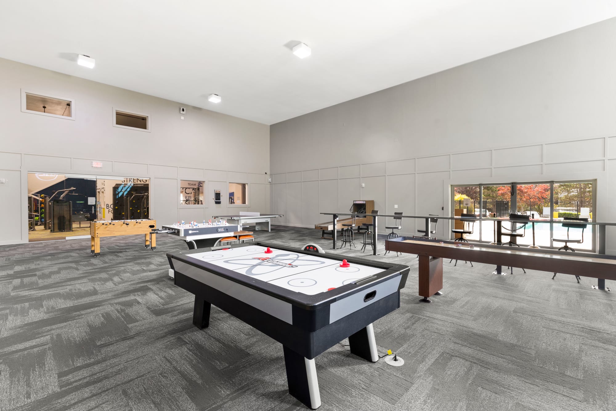 Game Room with Air Hockey, Shuffleboard, arcade games and more at Cascade Ridge in Silverdale, Washington