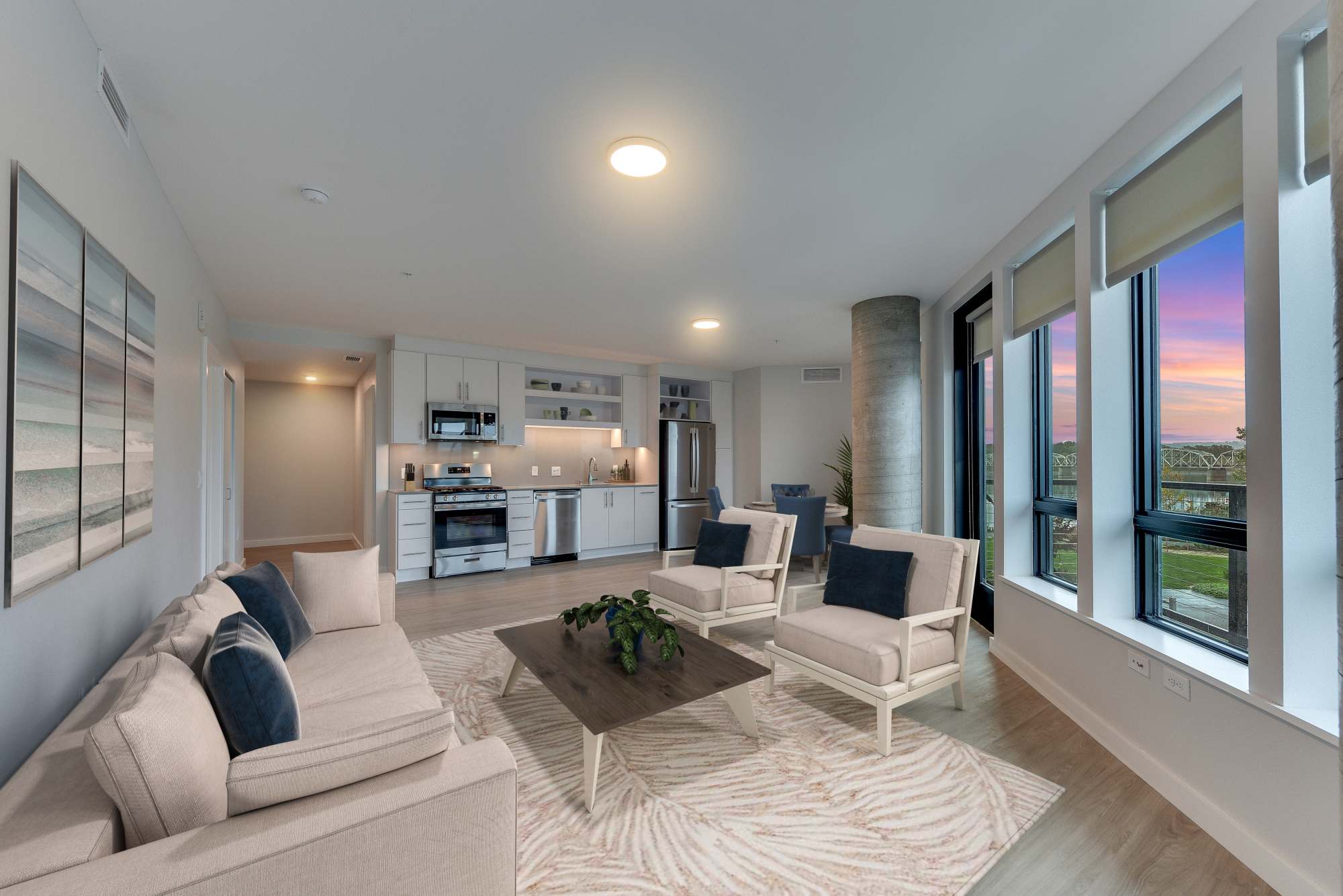 Living room with wooden flooring at The Columbia at the Waterfront in Vancouver, Washington 