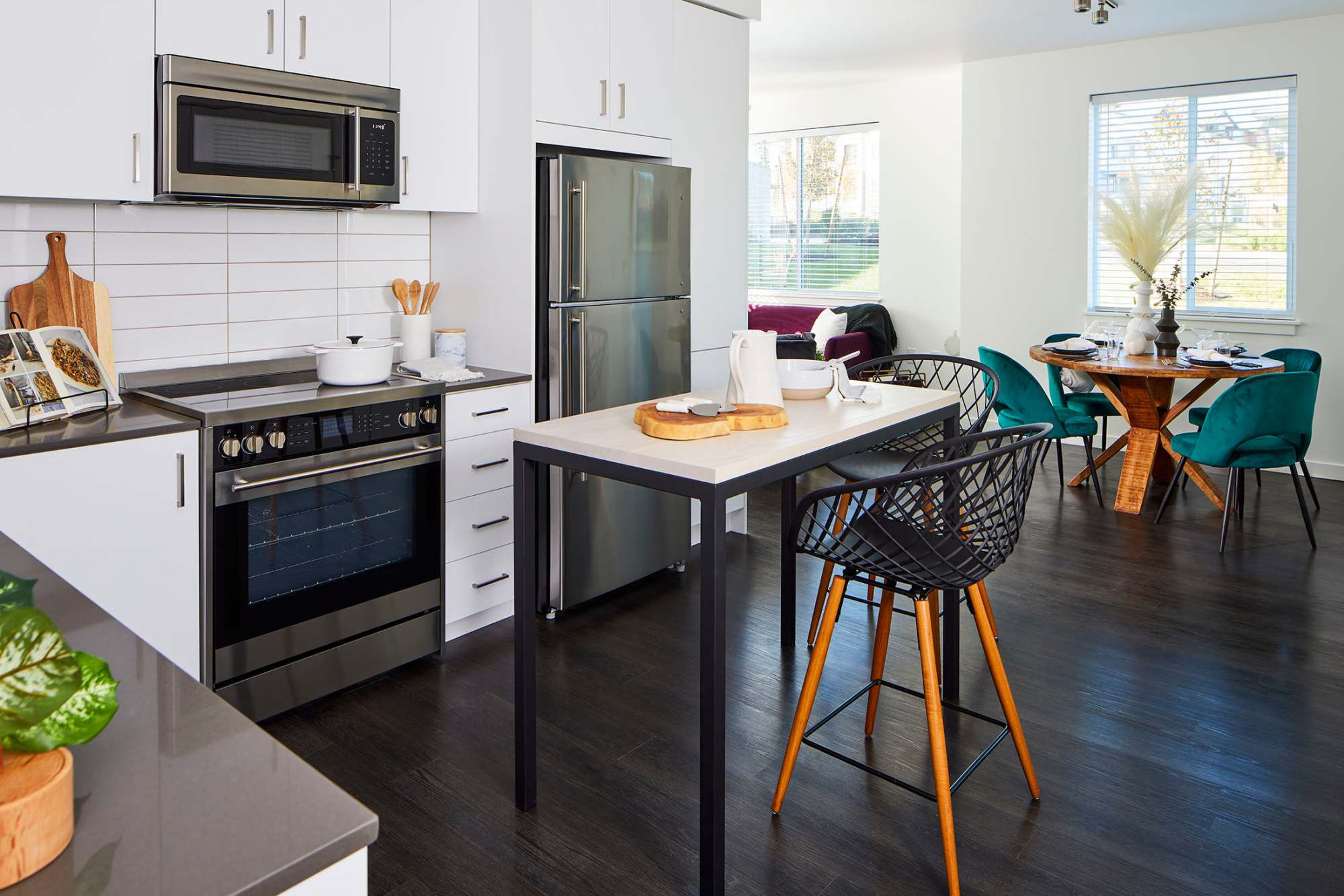 Fully equipped kitchen and dining table at Ambrose in Bremerton, Washington