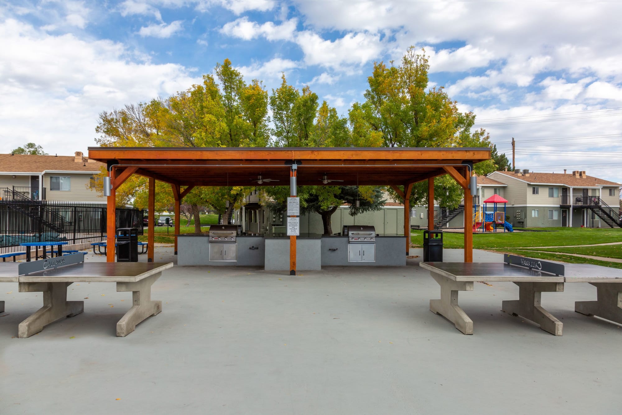 Covered outdoor BBQ Pavillion and ping-pong  at Callaway Apartments in Taylorsville, Utah