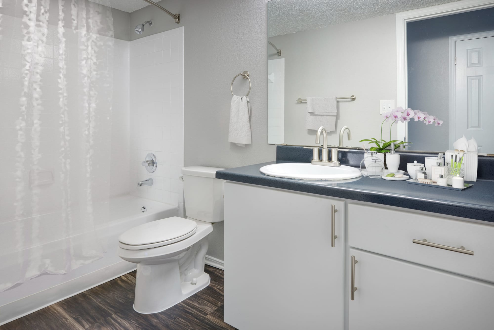 Renovated Bathroom with white cabinets at Altitude Westminster in Westminster, Colorado