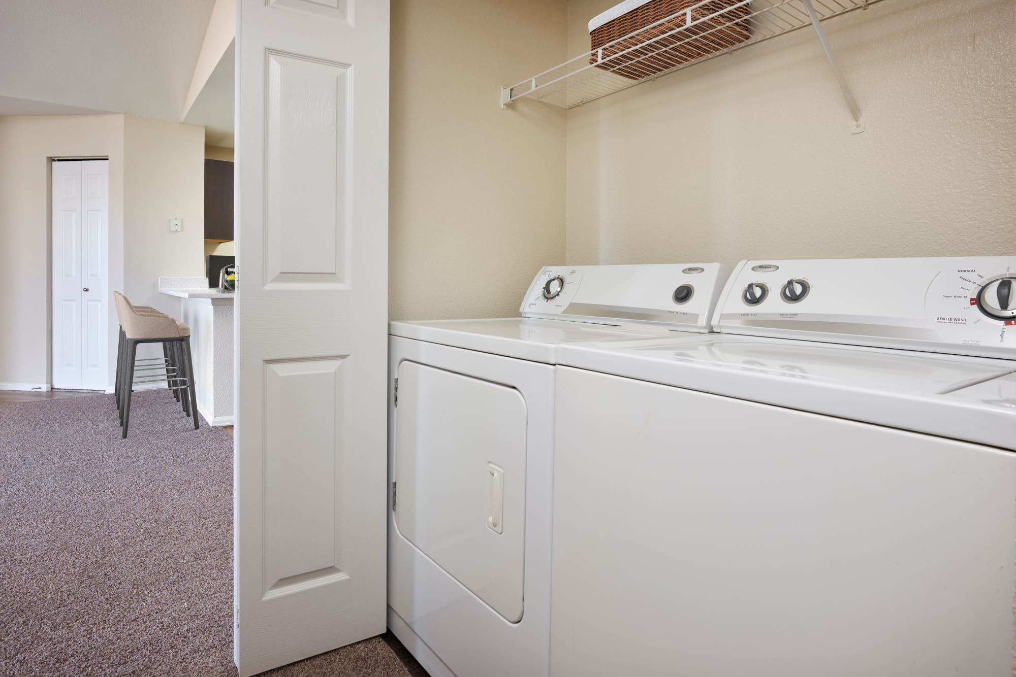 Washer and dryer at The Crossings at Bear Creek Apartments in Lakewood, Colorado
