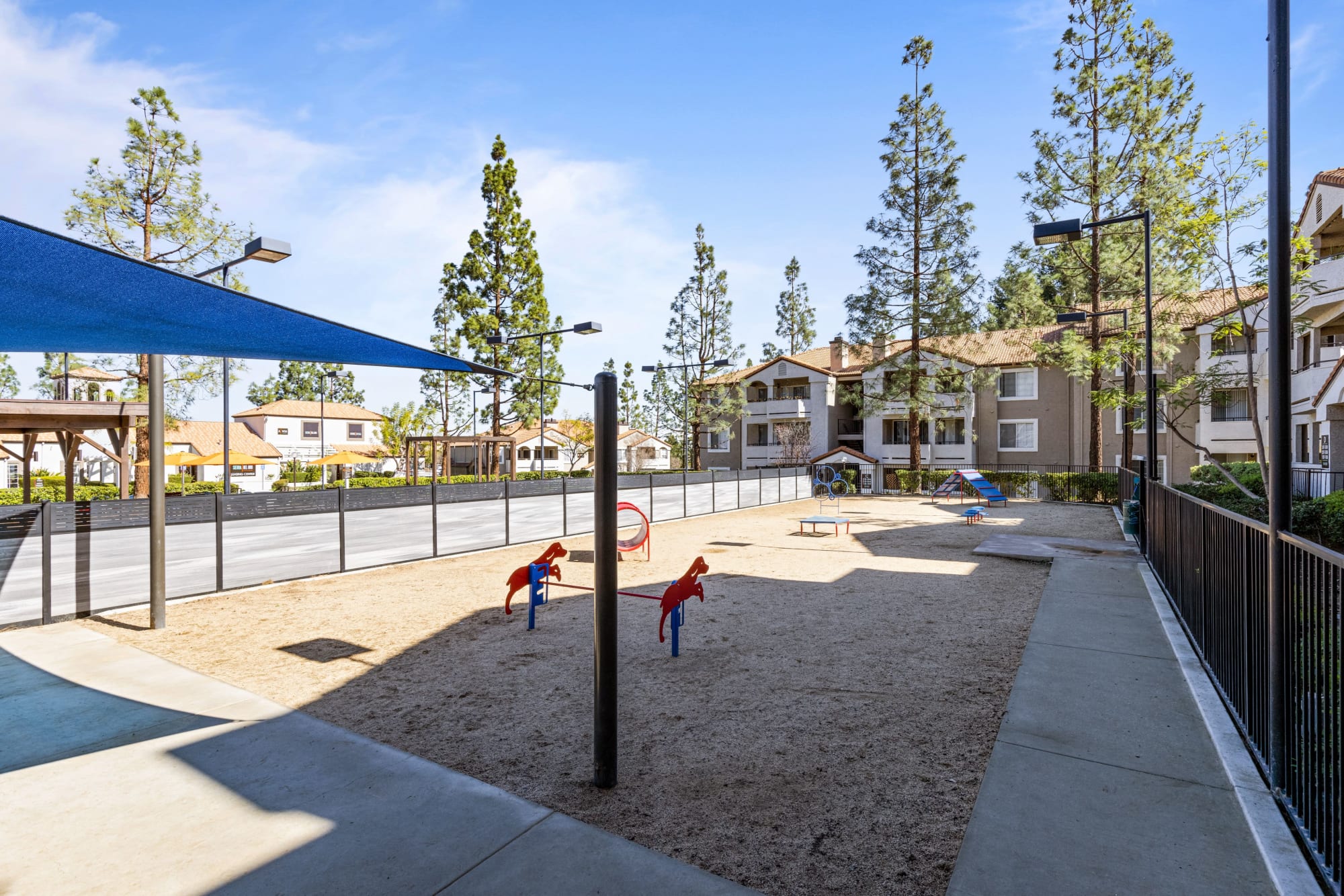 Off-leash dog park at Sierra Del Oro Apartments in Corona, California