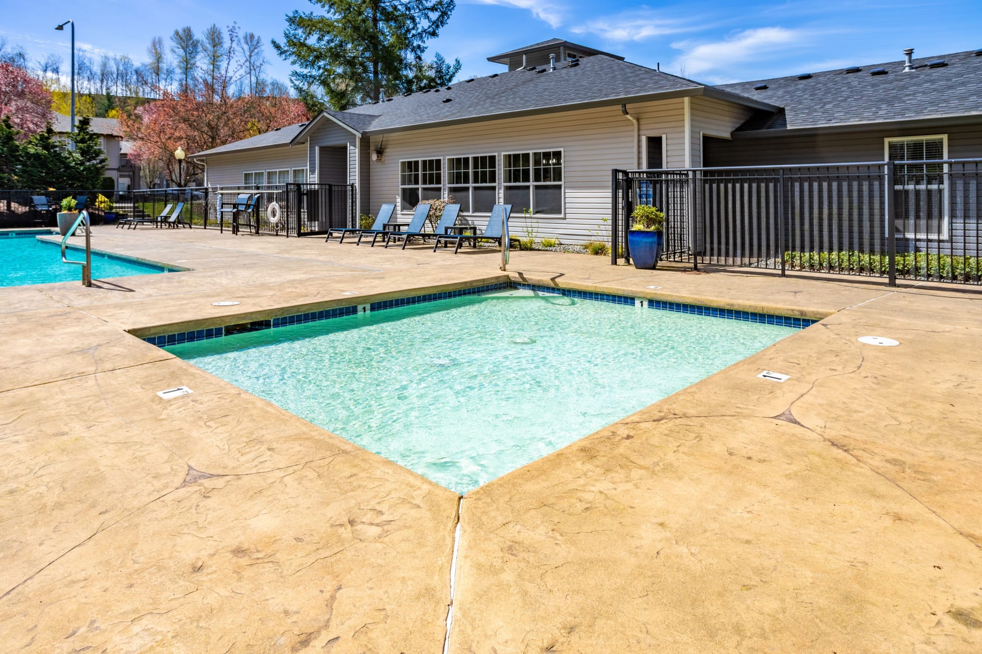 Fire pit and spa at Pebble Cove Apartments in Renton, Washington