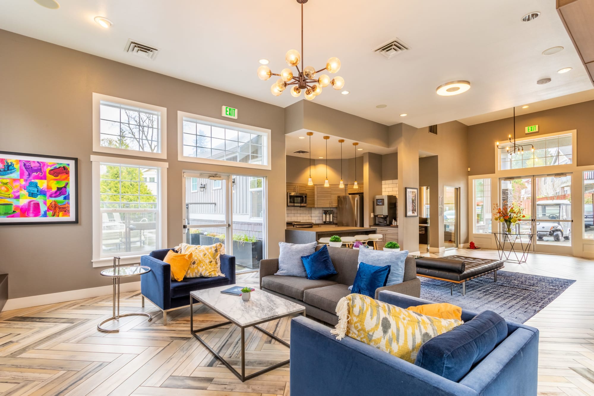 The clubhouse with bar seating and a fire place at Brookside Village in Auburn, Washington