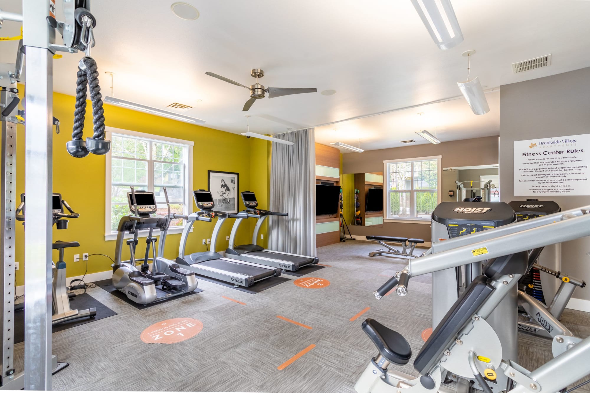 A fitness center with treadmills at Brookside Village in Auburn, Washington