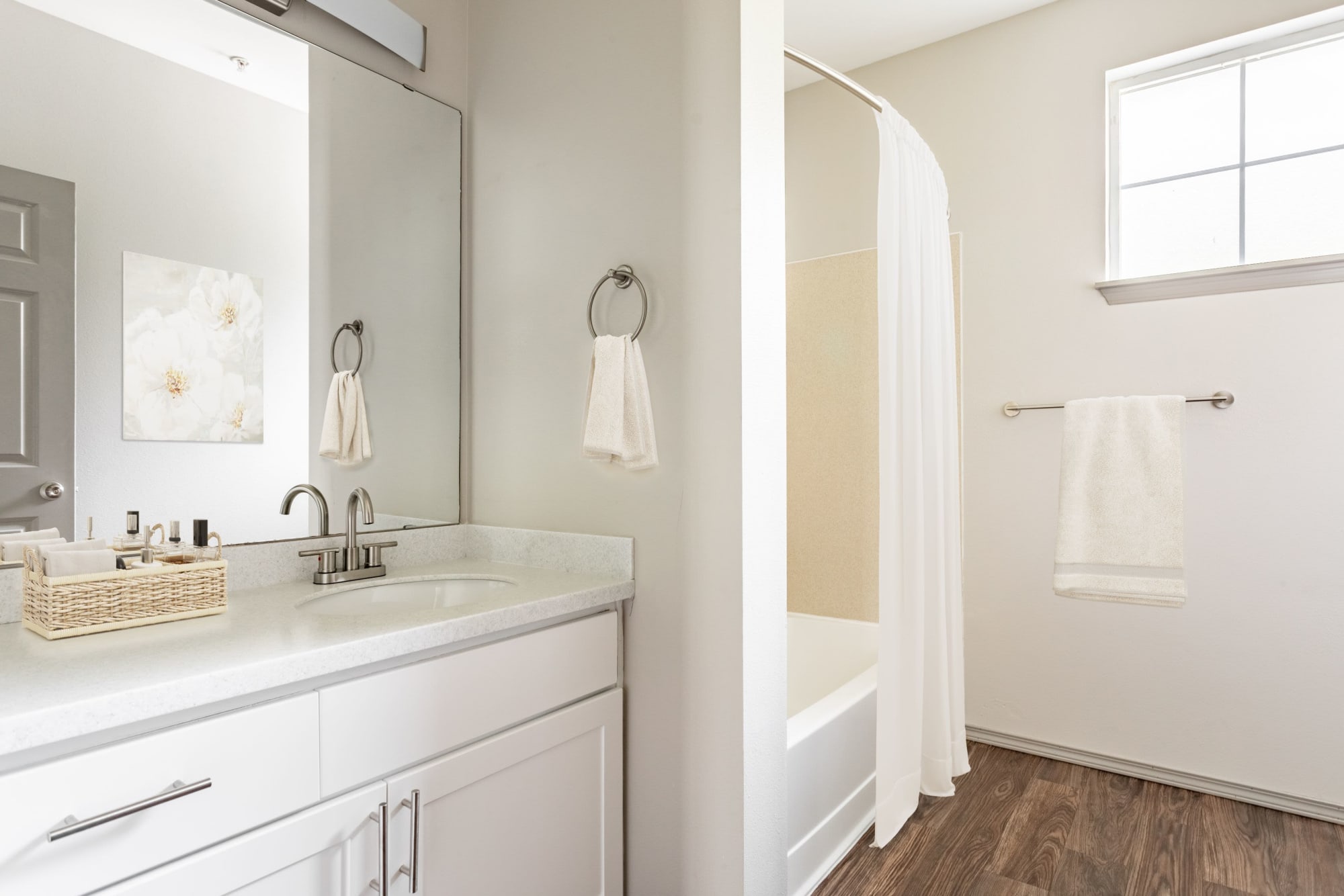 A bathroom with lots of counter space and tub at Brookside Village in Auburn, Washington