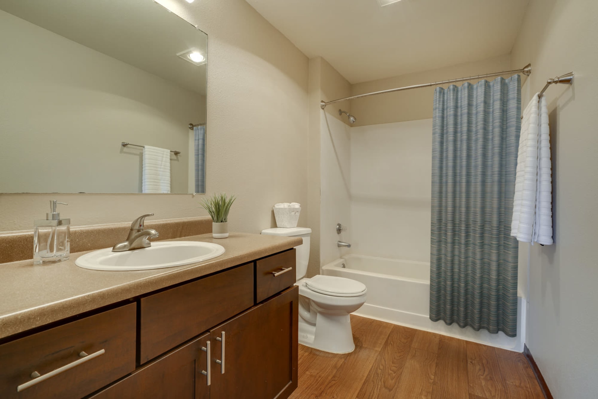 Bathroom with a tub at Renaissance at 29th Apartments in Vancouver, Washington