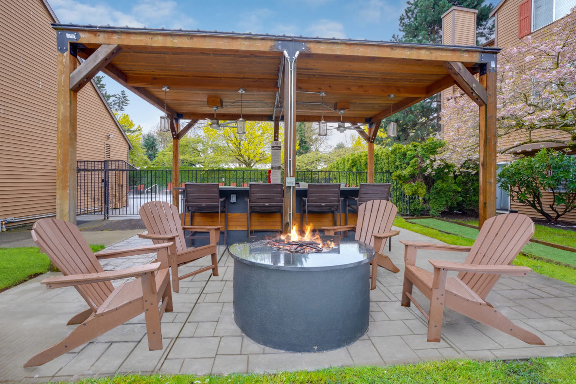 Covered BBQ and fire pit area at Renaissance at 29th Apartments in Vancouver, Washington