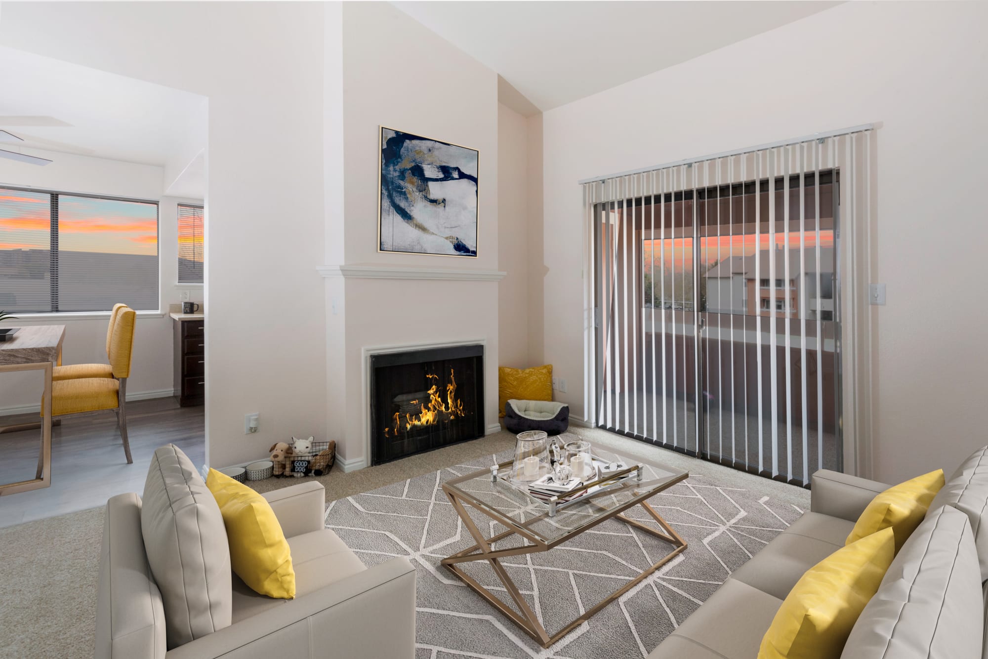 Living room with a fireplace at Shadowbrook Apartments in West Valley City, Utah
