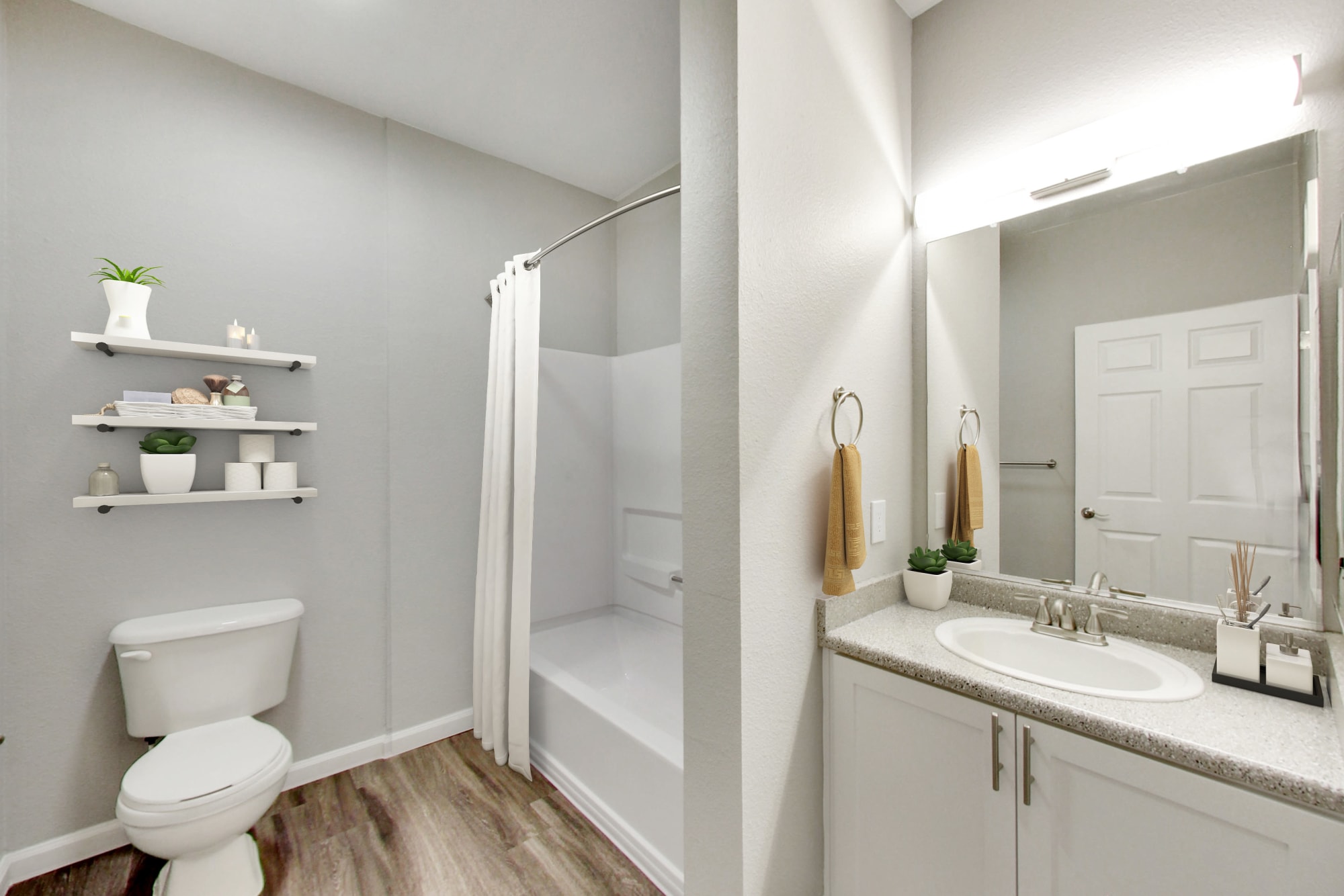 A renovated bathroom at Natomas Park Apartments in Sacramento, California