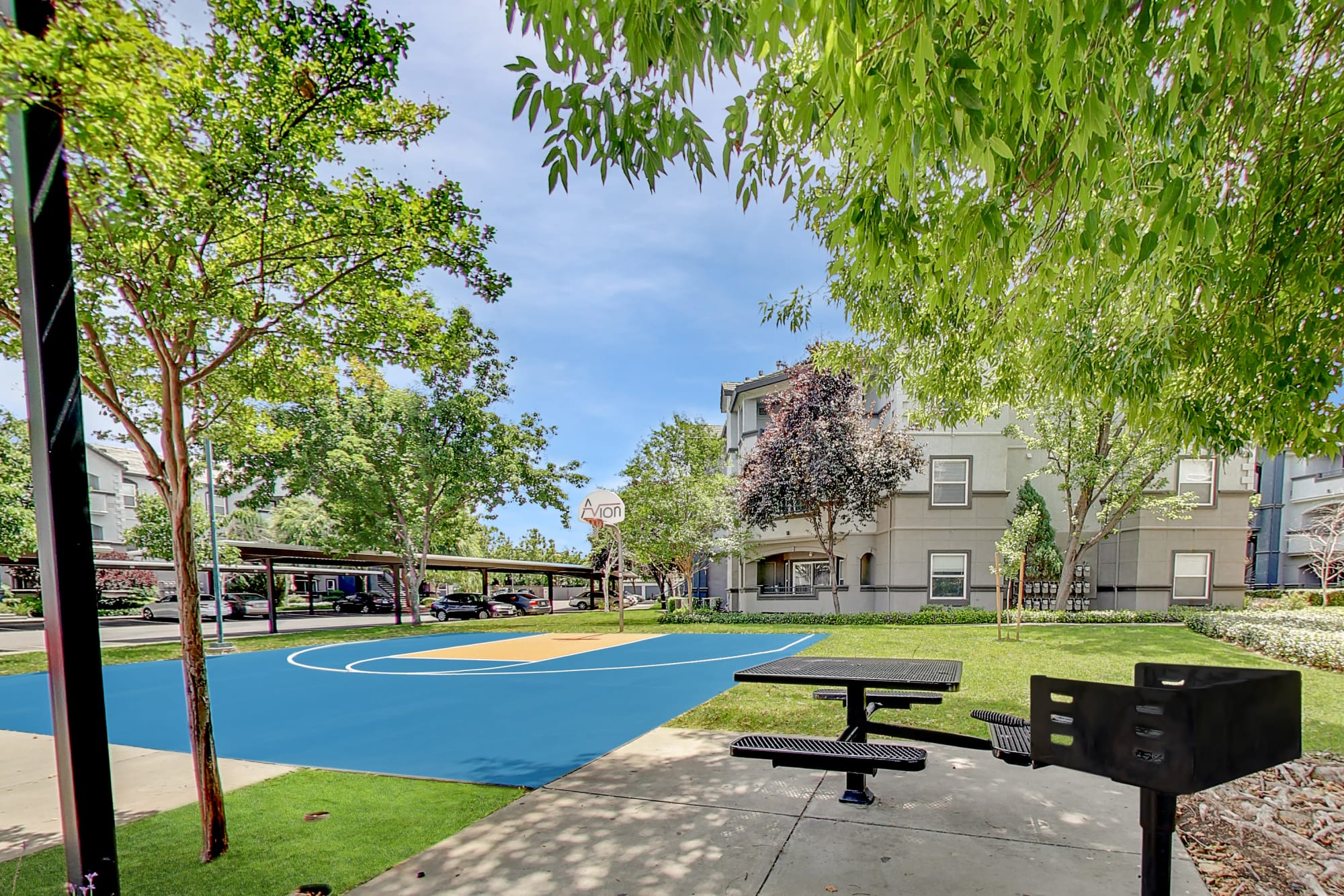 Community basketball court at Avion Apartments in Rancho Cordova, California