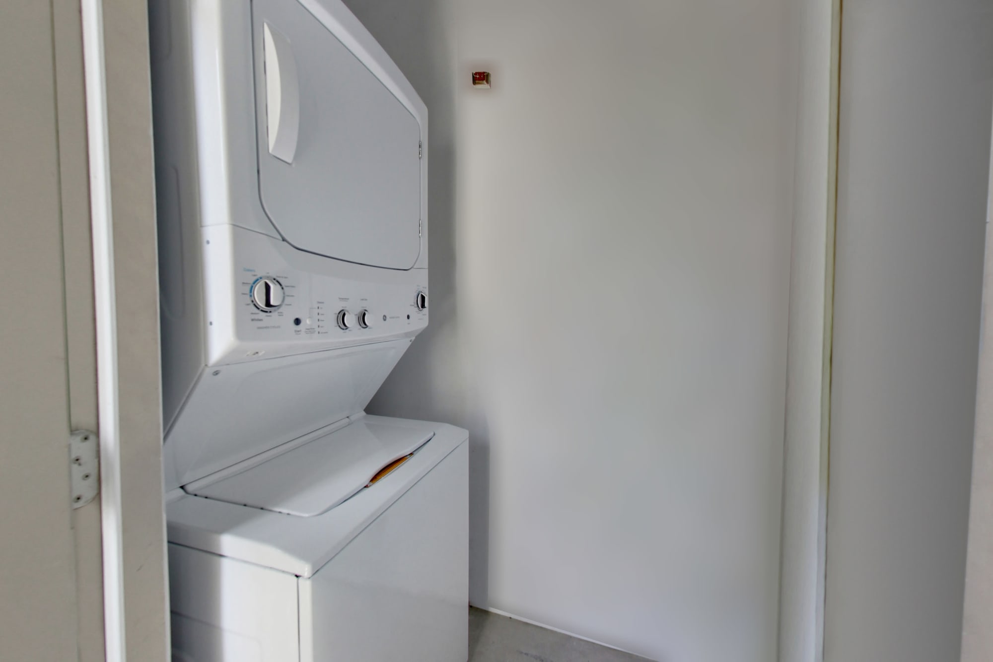 Stacked washer and dryer at Natomas Park Apartments in Sacramento, California