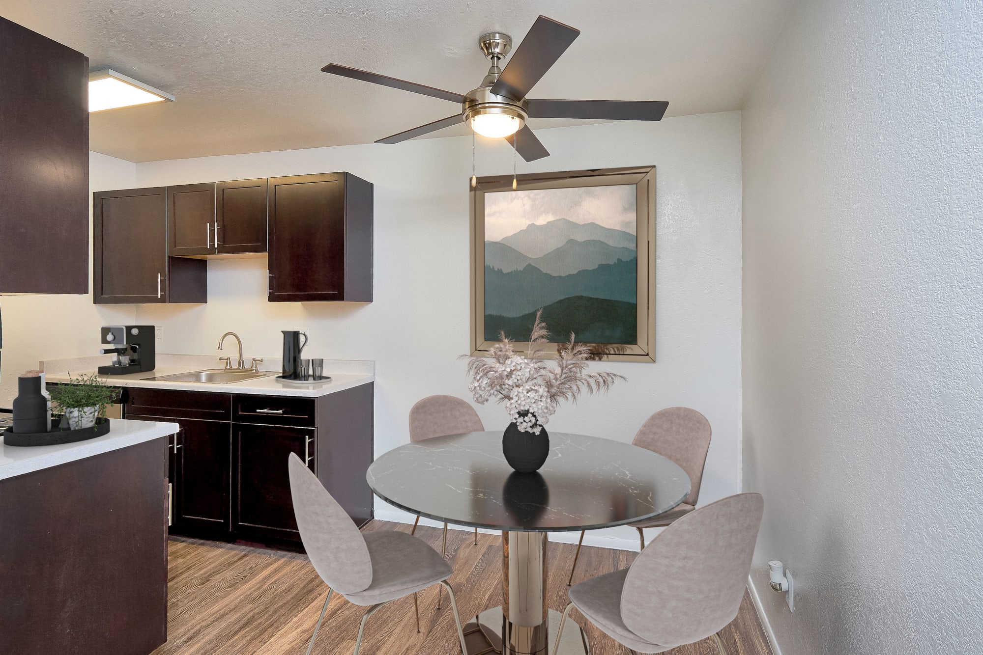 Recently renovated dining room and kitchen at Callaway Apartments in Taylorsville, Utah