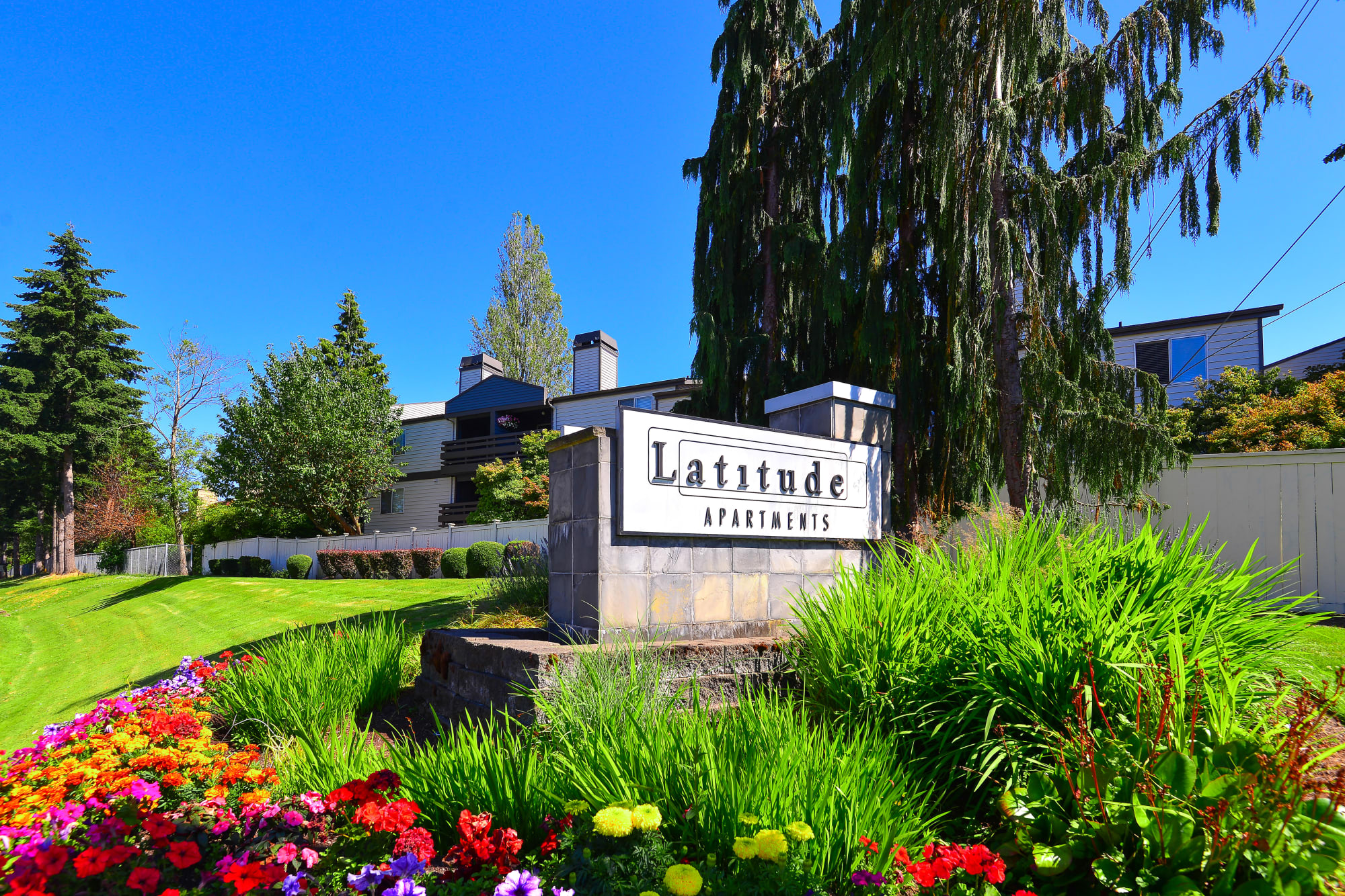 Monument sign and landscaping at Latitude Apartments in Everett, Washington