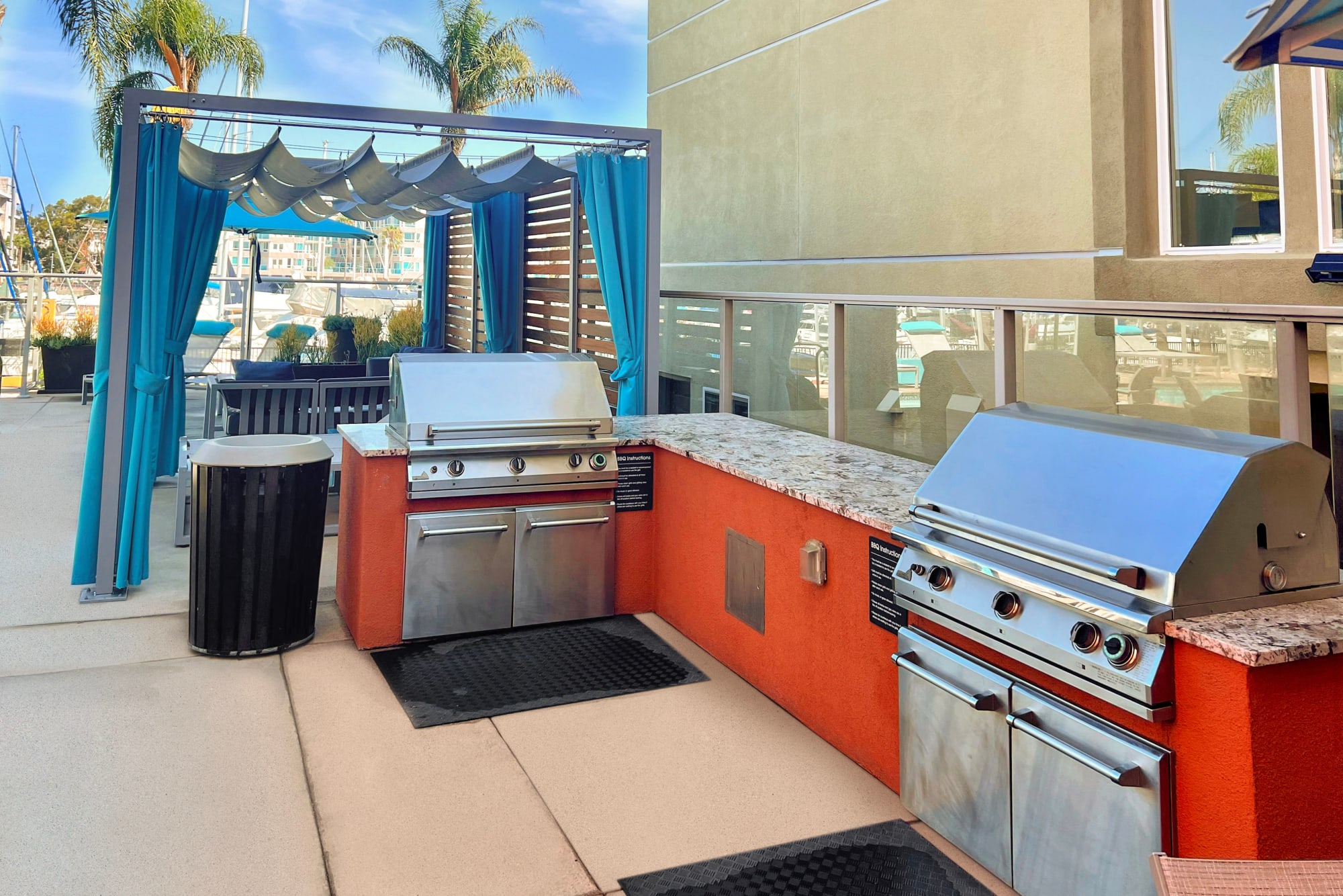 BBQ on the rooftop lounge at Harborside Marina Bay Apartments in Marina del Rey, California