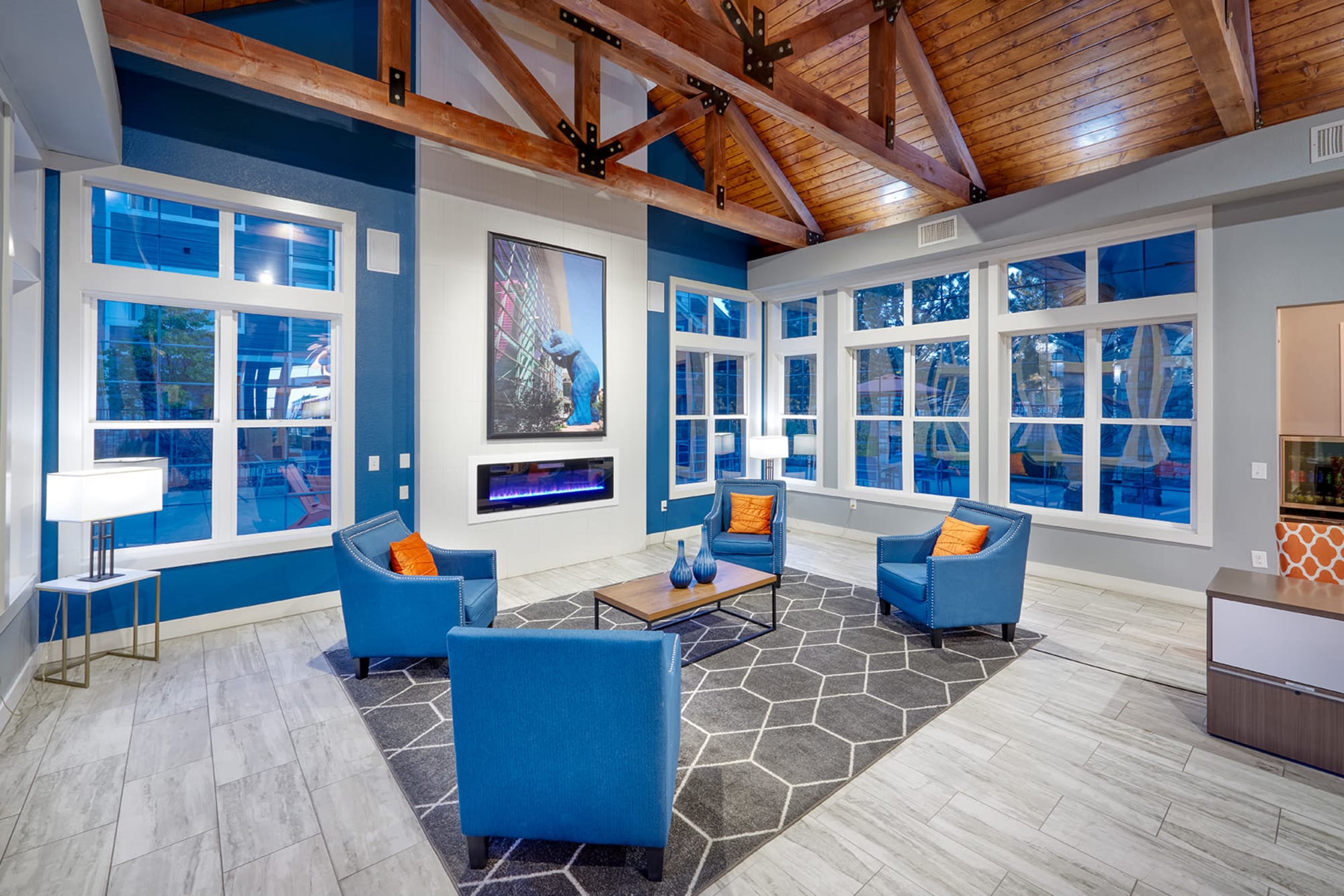 Clubhouse Seating Next to a Fireplace at Crestone Apartments in Aurora, Colorado