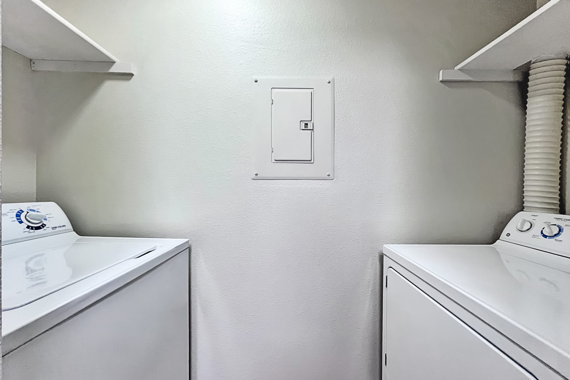 Washer and dryer at Newport Crossing Apartments in Newcastle, Washington